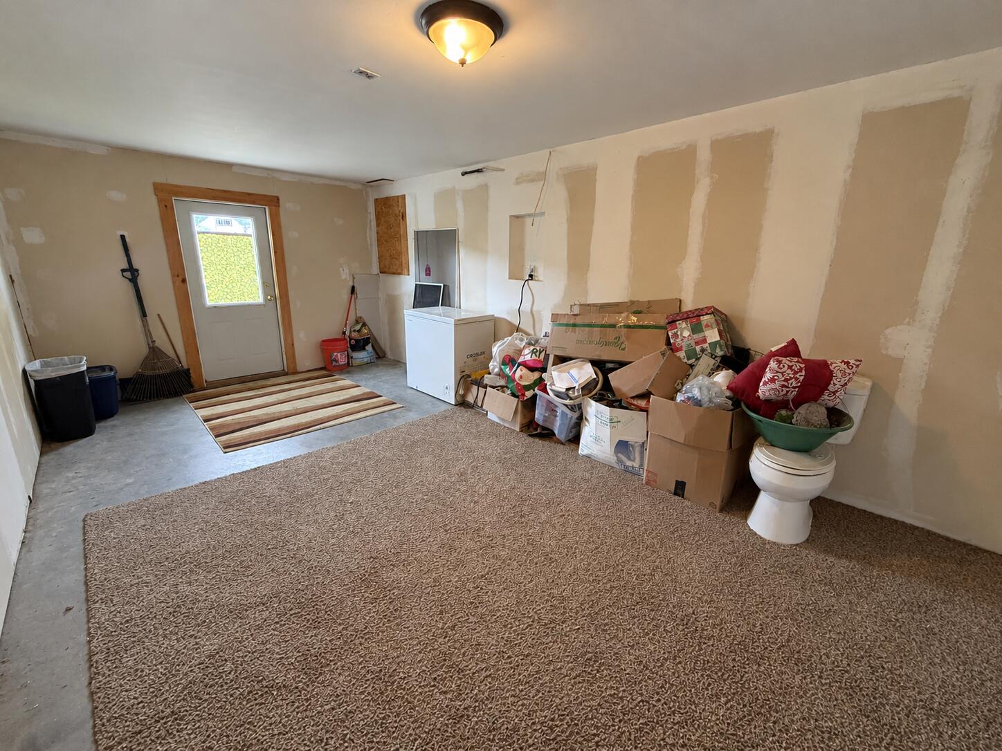 Garage Used as Storage Room and Entry