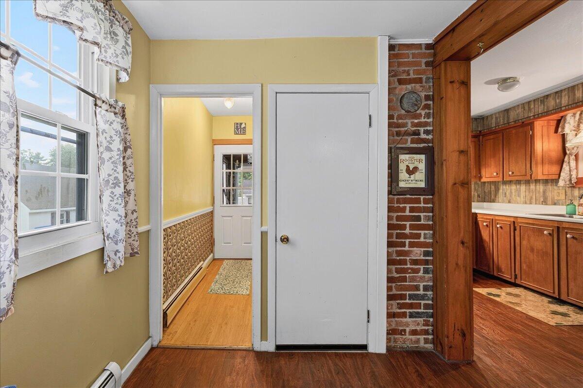 15 Commercial Street, Winterport, ME 04496 Entrance from the enclosed porch and the basement stairs