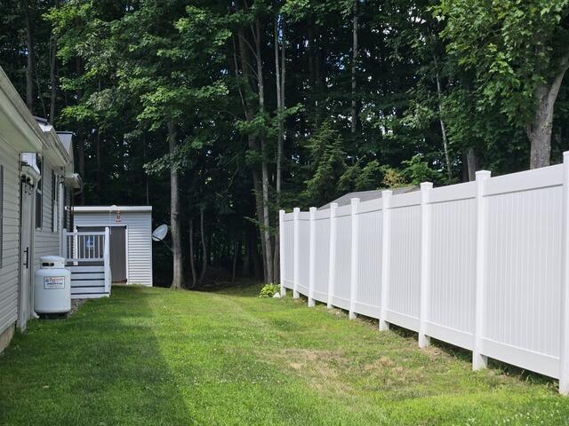 34. Fenced on rt side of property