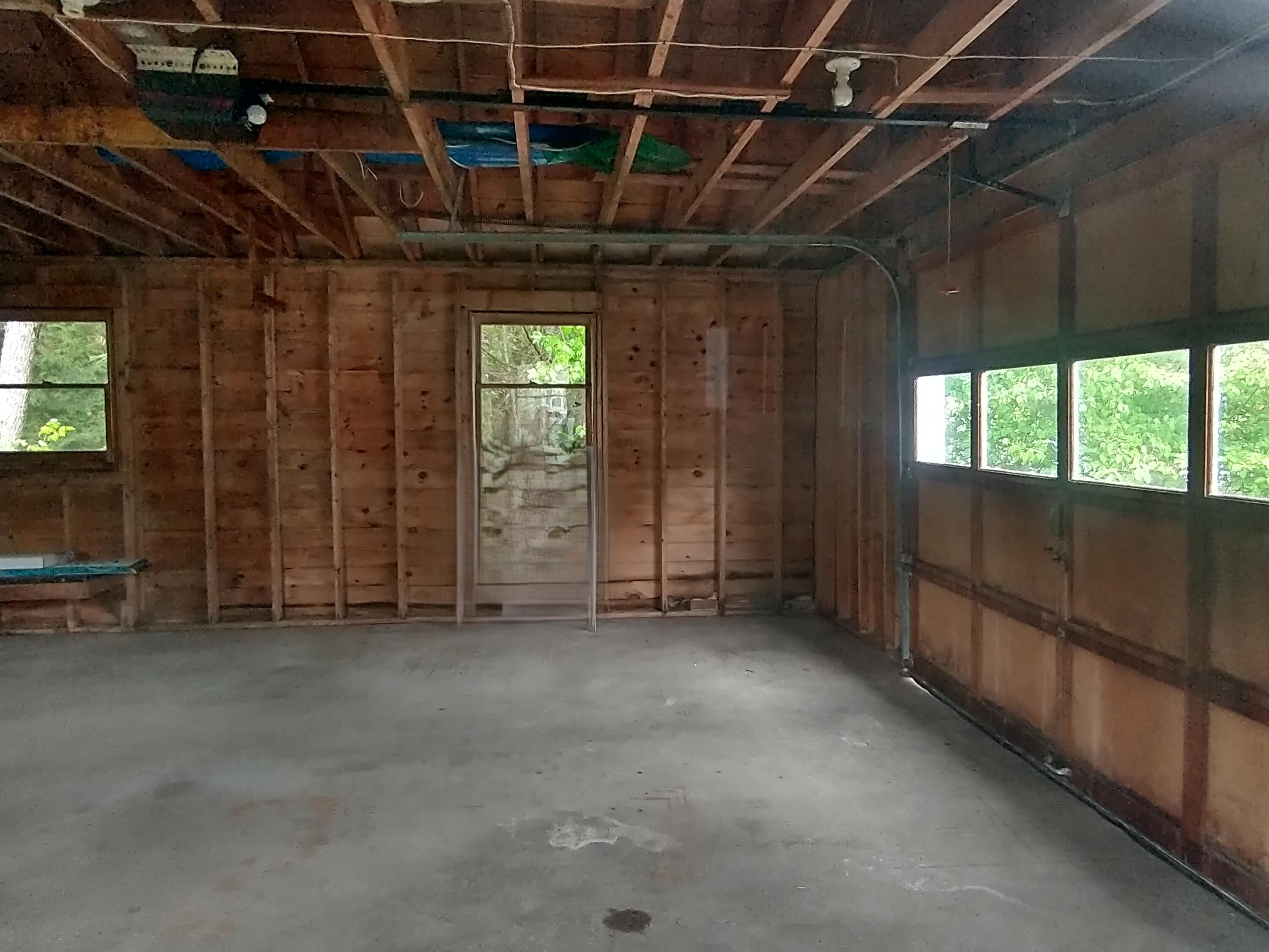 57 Carter Woods, Bradley, ME 04411 Spacious garage with overhead storage