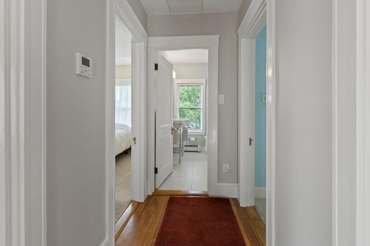 14 Holly Street, Portland, ME 04103 Center hallway on second level main house leads to 4 corner bedrooms and bath