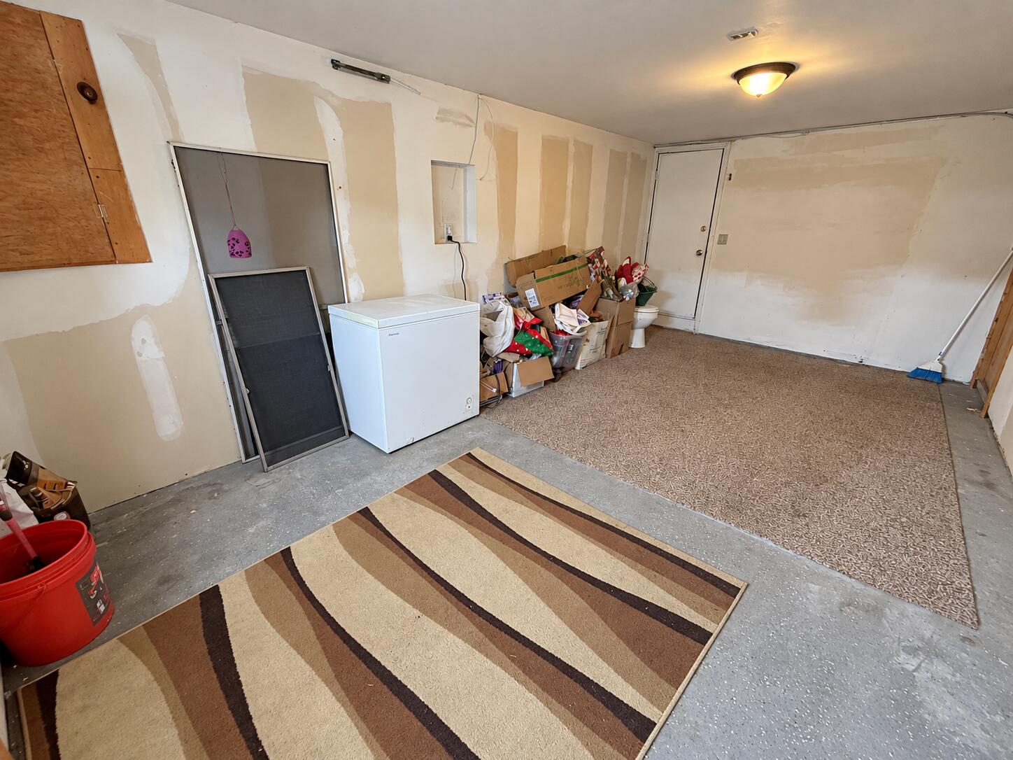 Garage Used as Storage Room and Entry