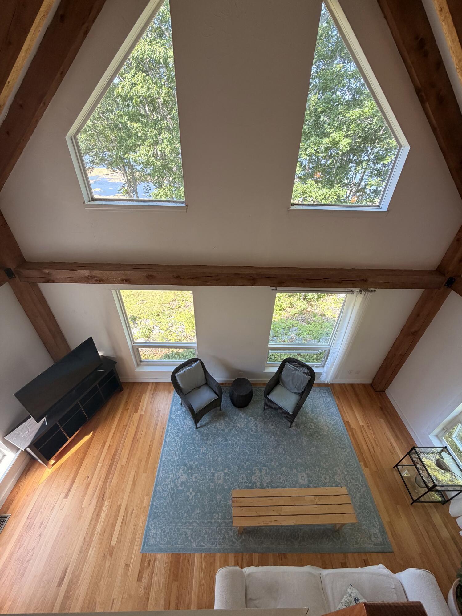 98 Bagaduce Lane, Sedgwick, ME 04676 View from the second level, sitting area into the living room