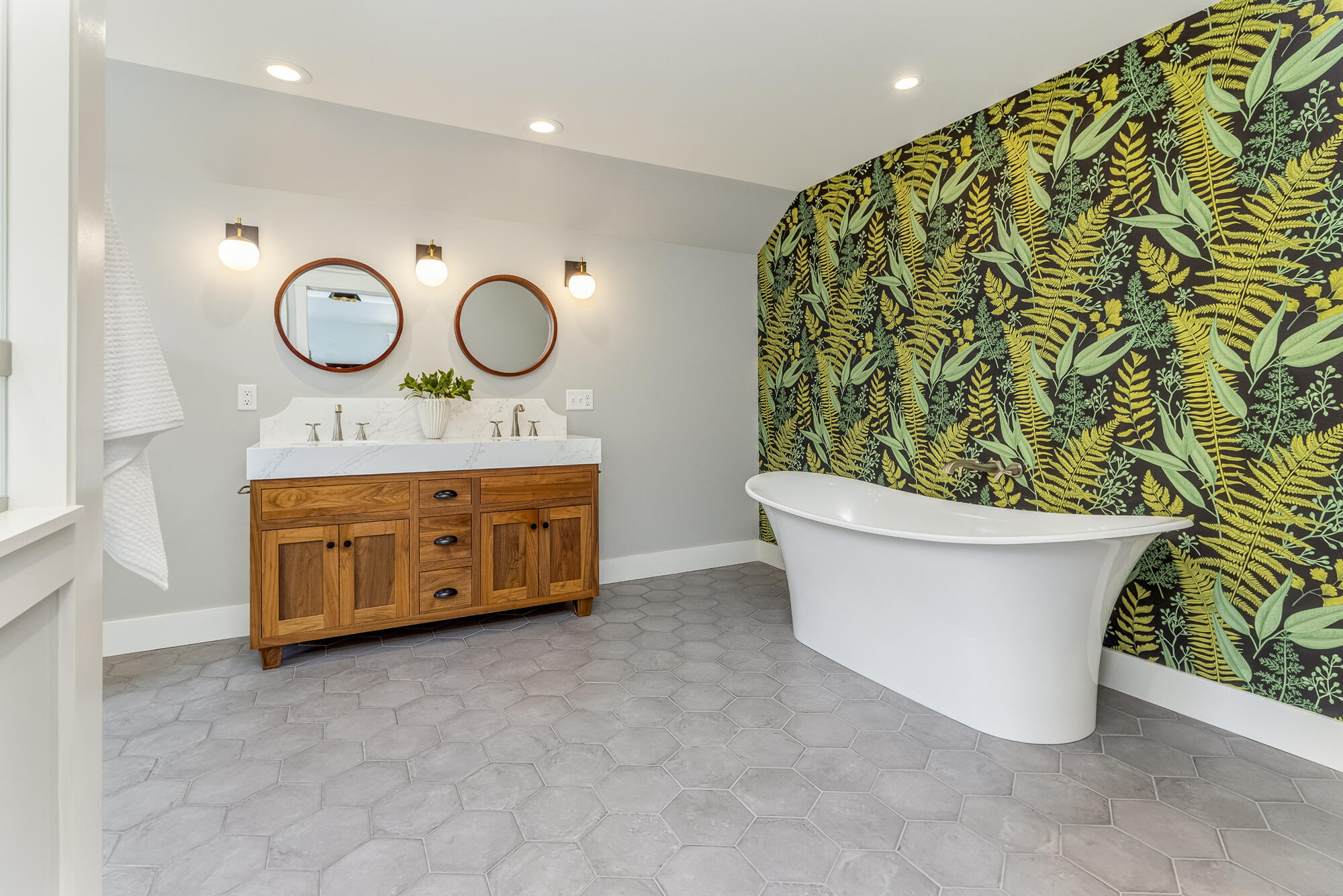 Primary bath with custom walnut double vanity