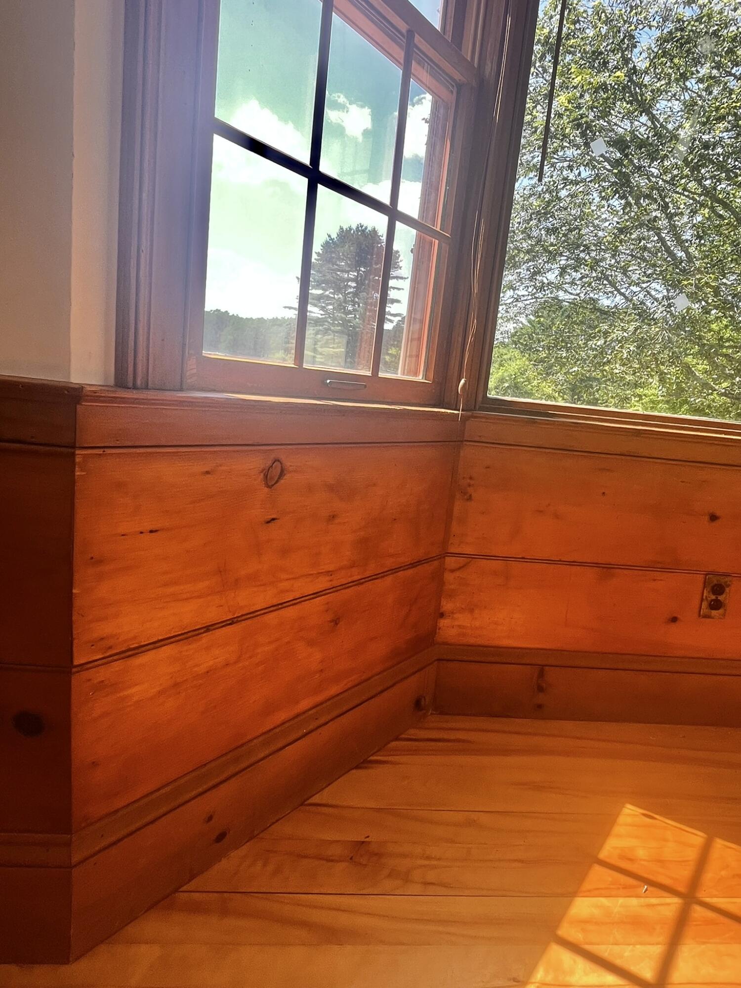 Antique wide board wainscoting.