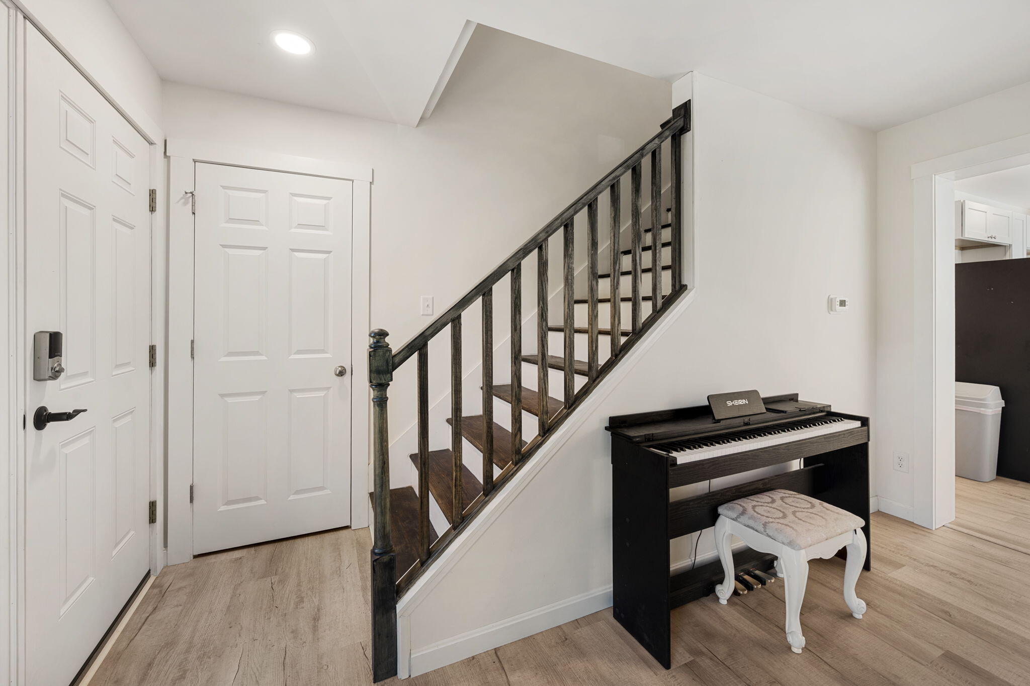 Stairway with Coat Closet