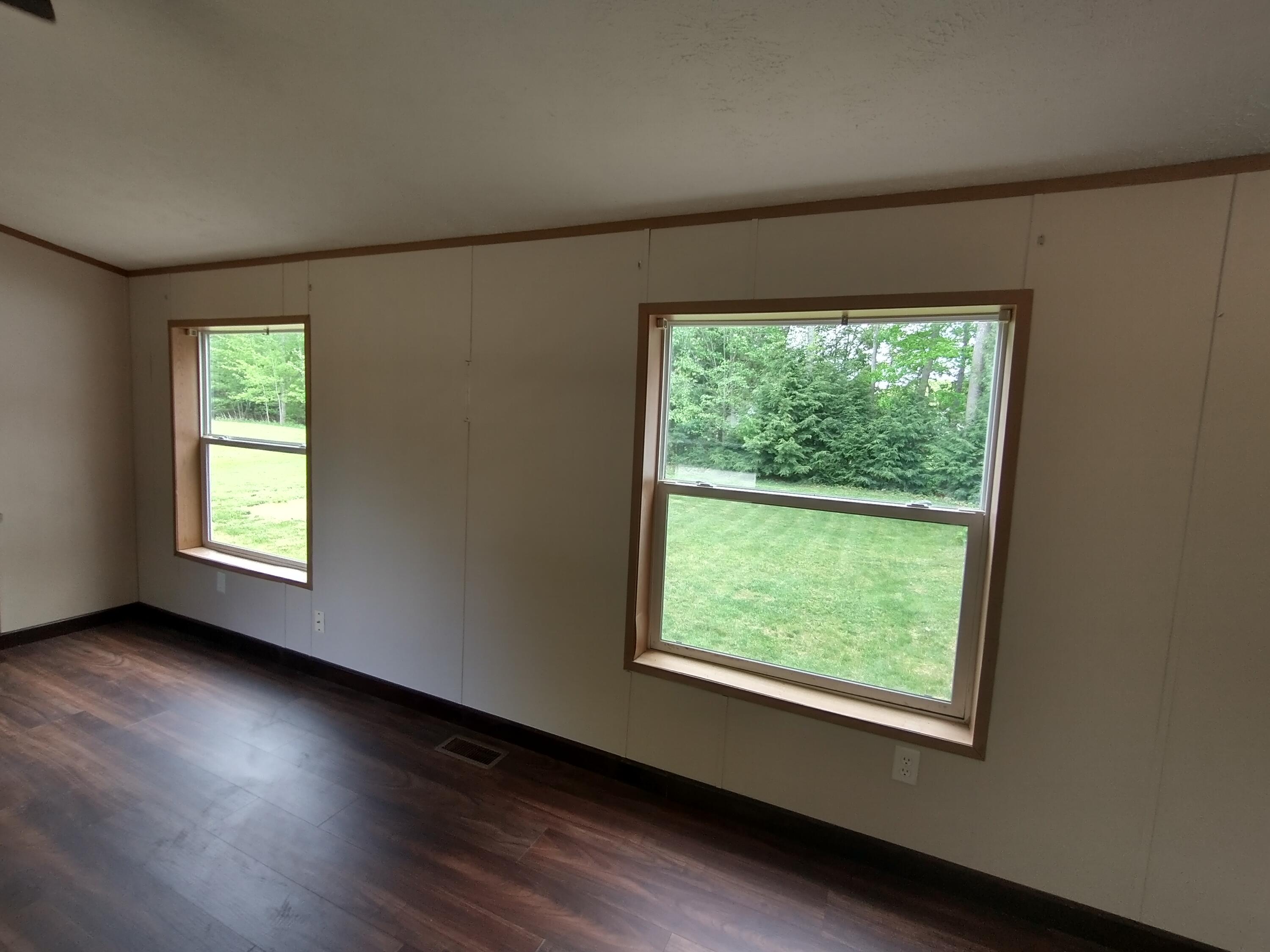 57 Carter Woods, Bradley, ME 04411 Living Room view to back yard