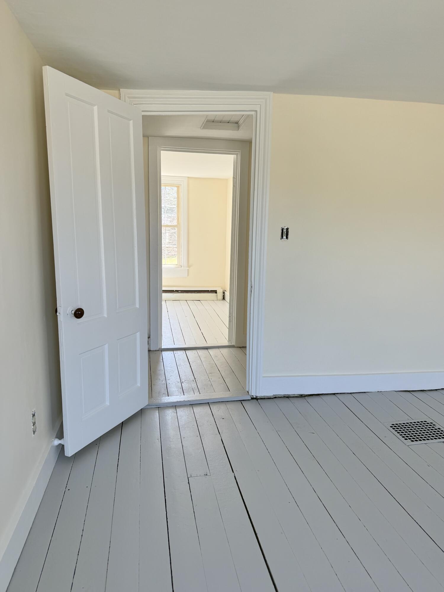 View from primary bedroom looking into guest bedroom