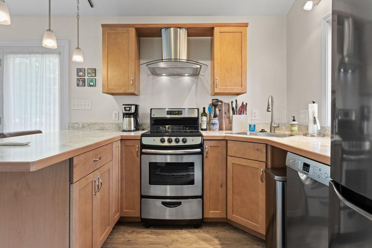 14 Holly Street, Portland, ME 04103 Beautiful, modern kitchen is fully applianced in rear apartment