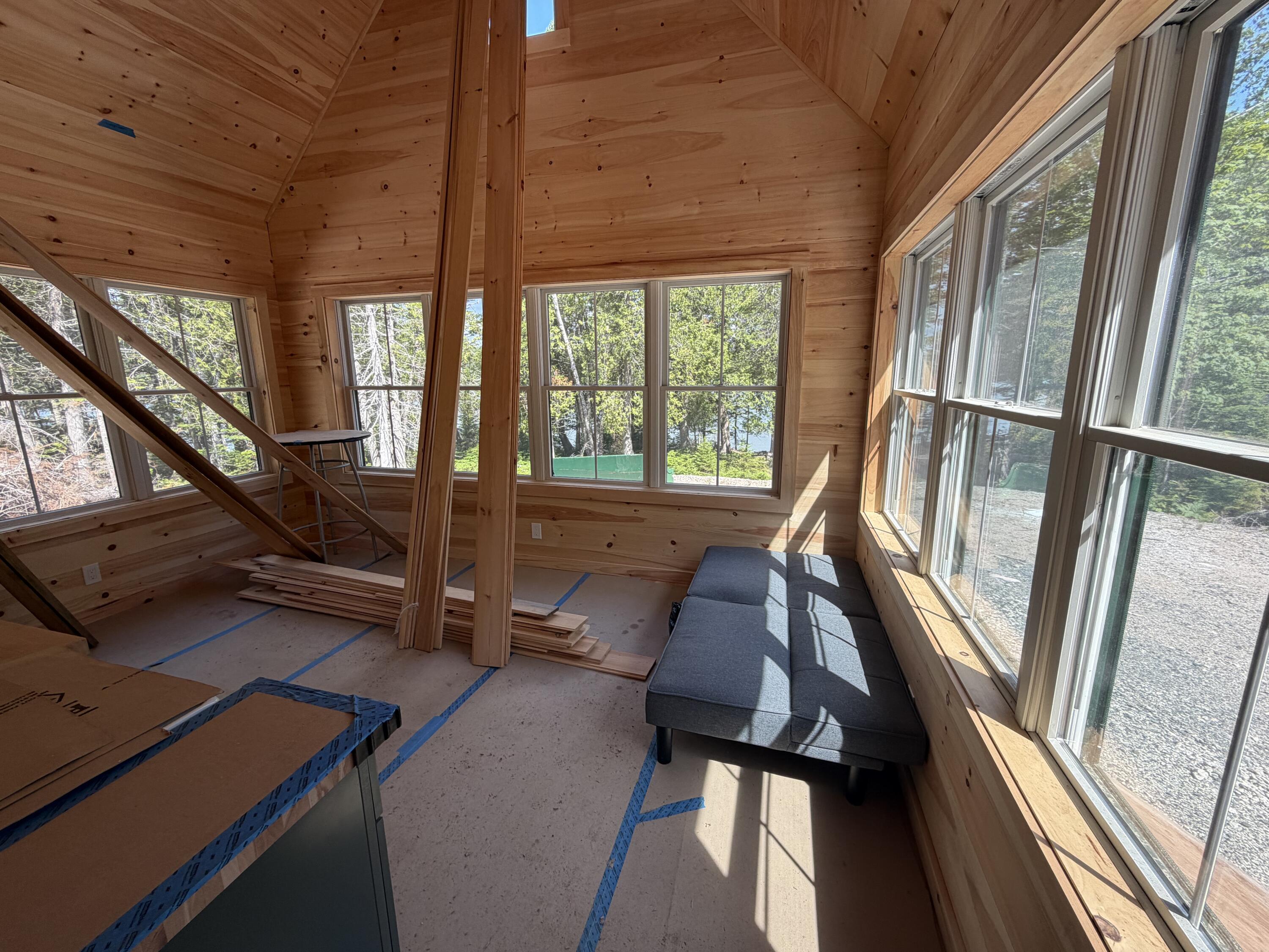 86 Back Shore Road, Steuben, ME 04680 Open living and kitchen area.