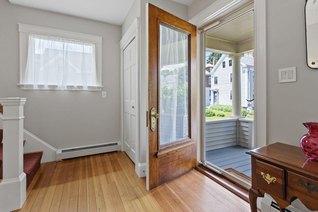 14 Holly Street, Portland, ME 04103 Inviting front foyer with rich wood floors a natural lighting