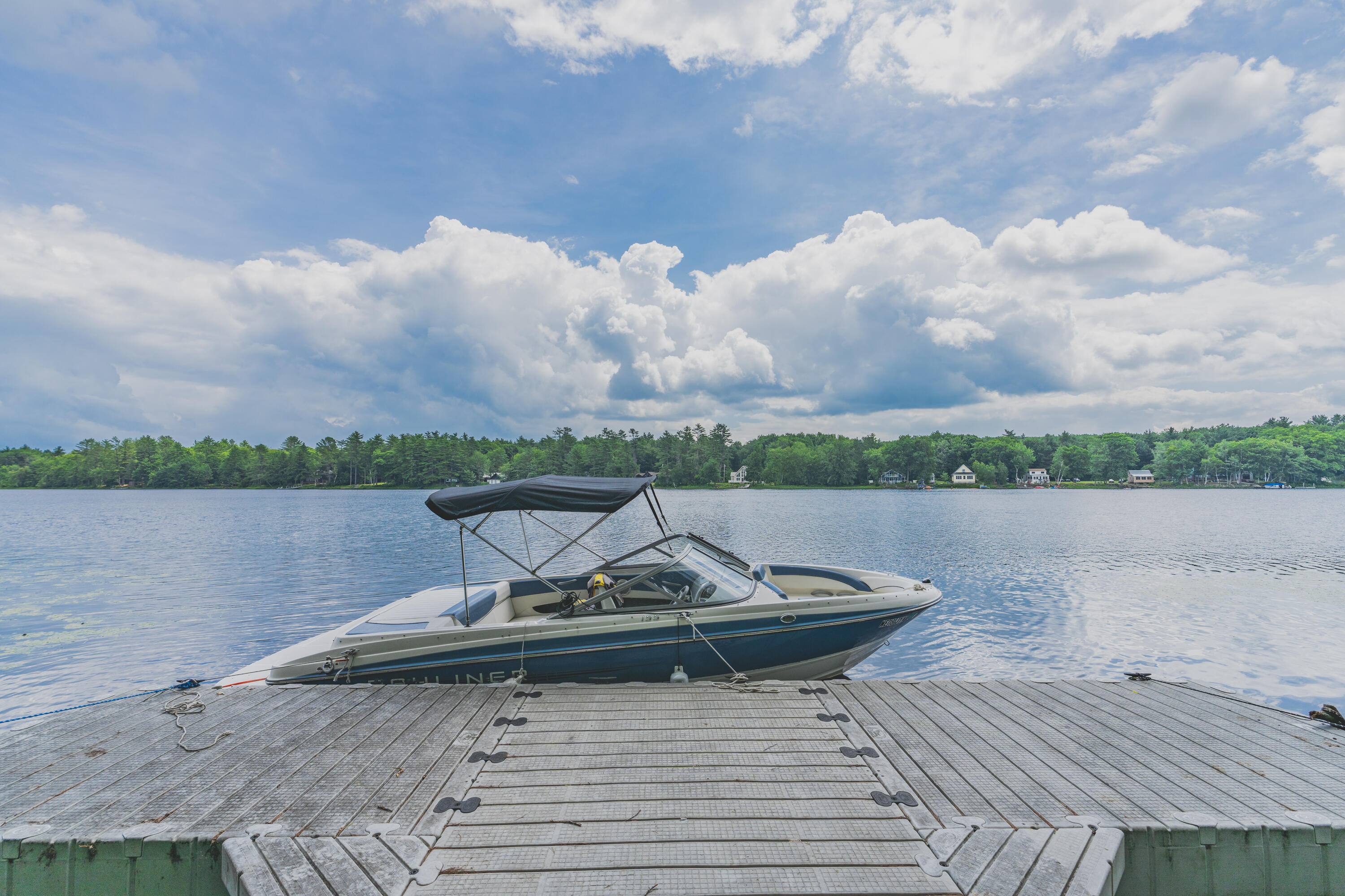Just two minutes by boat from the mainland, this 19.0± acre freshwater island on Long Pond offers a shorefront retreat unlike any other with 2,370 square feet of indoor-outdoor living space. The island's elevated site slopes gently to the water, making arrivals easy. On the mainland, a well-equipped boathouse provides essential support--it features a clear garage door overlooking the lake, perfect for storing perishables, charging devices, and running Wi-Fi. Nestled into the island's wooded landscape is a collection of artfully designed, fully insulated pods. The main dwelling faces east, capturing the first light of day from every angle. Three sleeping pods are connected by breezy, atrium-like galleries that invite quiet moments with a book or a cup of coffee. The kitchen pod awaits your off-grid culinary adventures, with open-air access to the deck and plenty of space to prep, cook, and gather. Near the water's edge, a fully insulated camping pod offers extra sleeping space with its own clear garage door, a covered porch with ceiling fan, and a rubber roof perfect for pitching tents to host additional guests. At the heart of the island is a central fire pit--made for tin foil dinners, marshmallow roasts, and late-night storytelling under the stars. Whether you're seeking a secluded escape, a one-of-a-kind family compound, or a glamping destination ready to welcome guests, this property delivers. Its flow between pods, decks, and natural landscape creates an experience that feels both intentional and effortless. All of this just 23 minutes to Augusta, 33 minutes to Damariscotta, 1 hour and 13 minutes to Portland, and 3 hours to Boston. A rare opportunity to steward something truly special.
