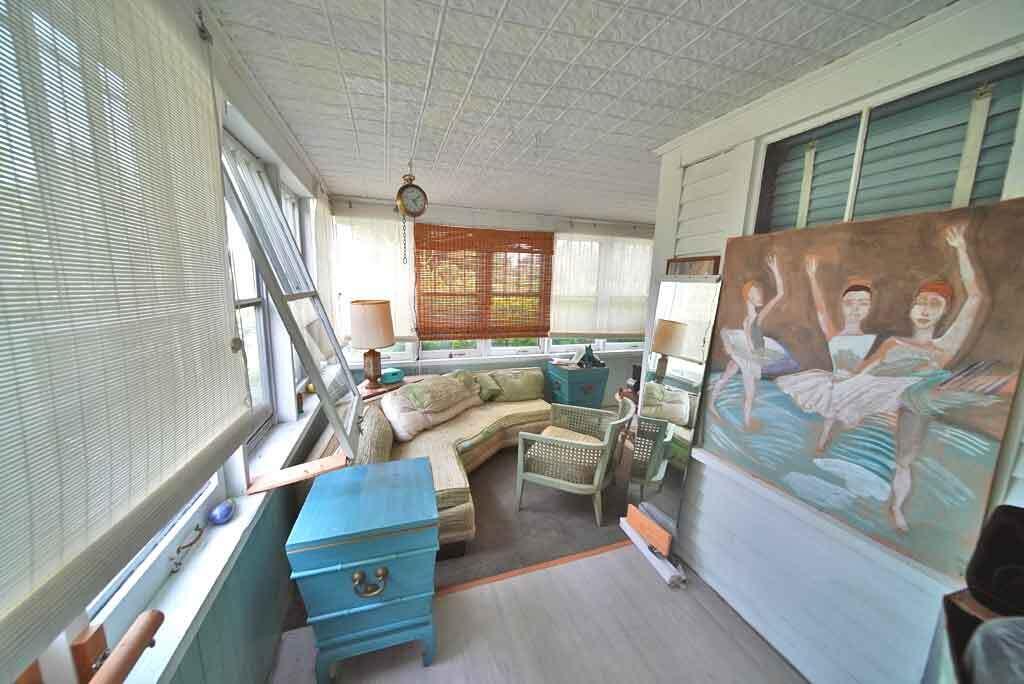 95 Sunset Park Road, Orient, ME 04471 wrap-around-porch-tin-ceili
