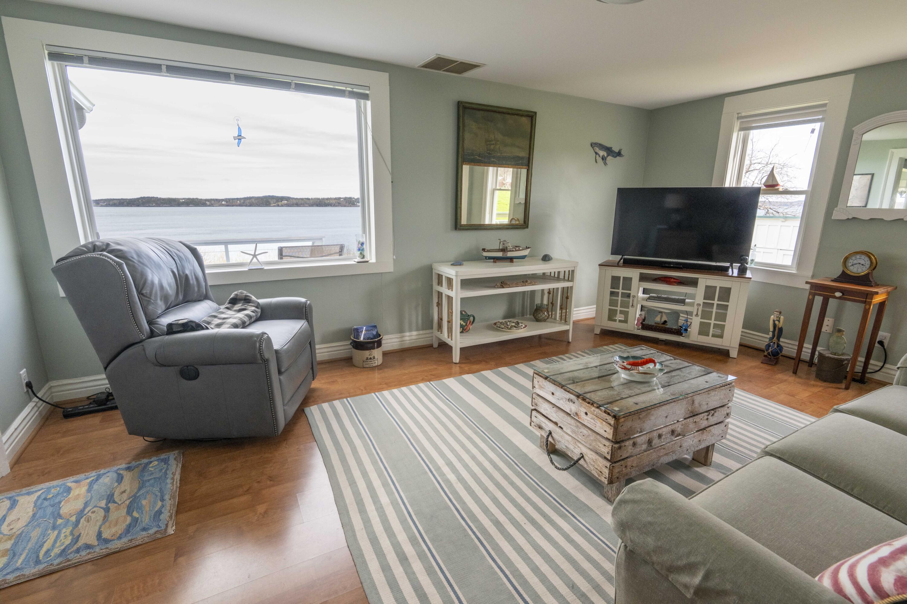 26 Madison Street, Eastport, ME 04631 Living room- ocean side of house with wonderful views