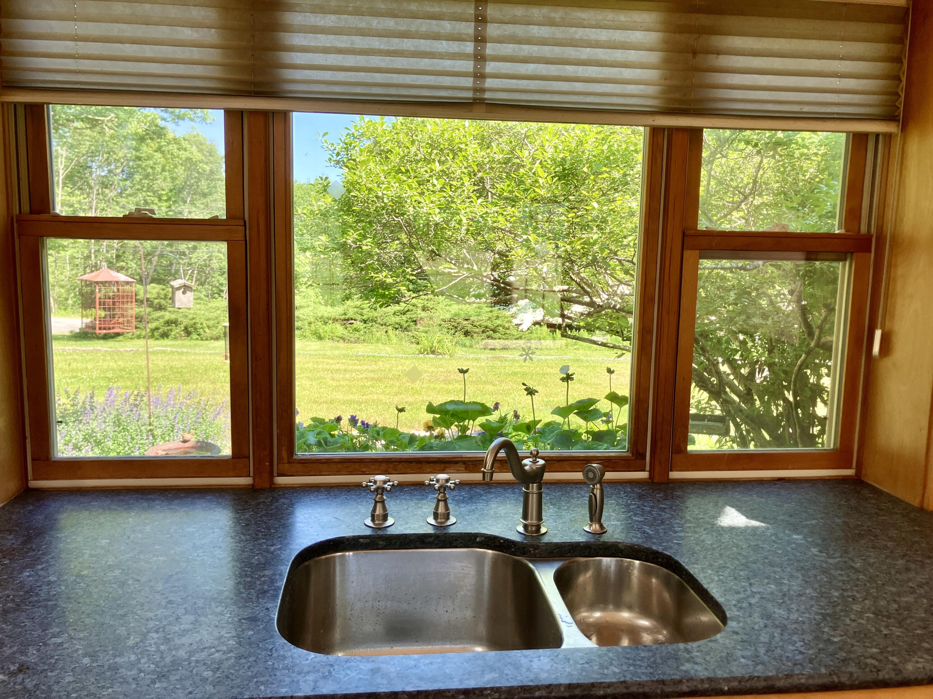 Amazing views out the front windows over the gardens and stonework.