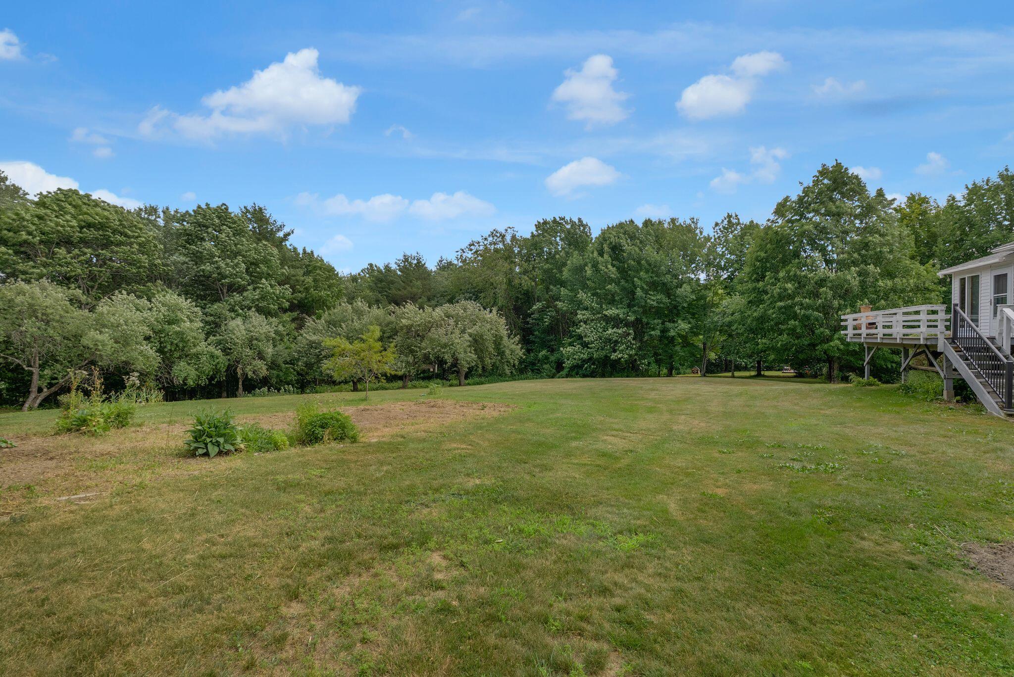 155 Ridge Road, Lisbon, ME 04252 The large level yard provides plenty of room for all sorts of outdoor activities.