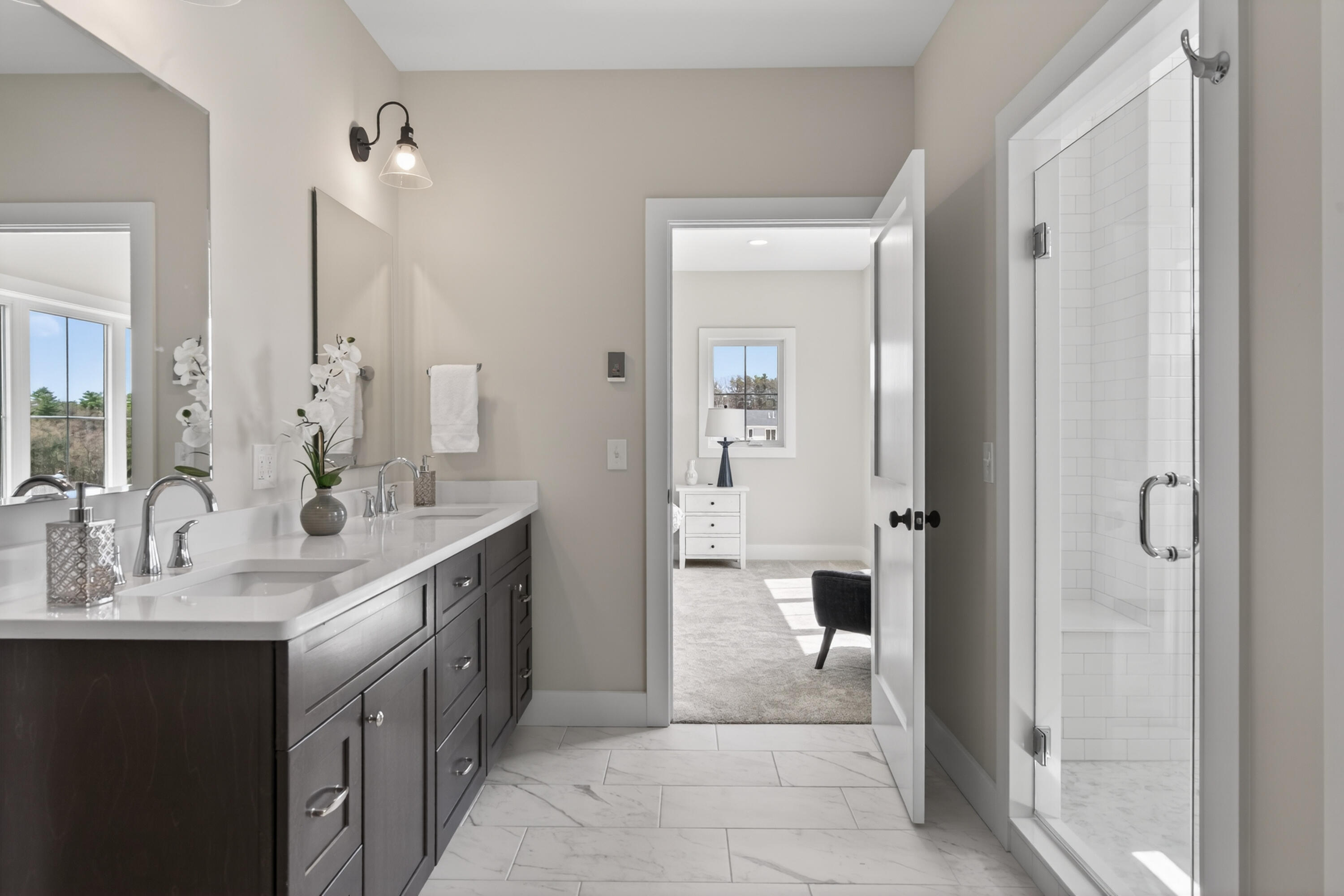 163 Owl's Nest Road, Portland, ME 04102 Primary bath with double vanity, fully tiled shower, water closet, and radiant heat
