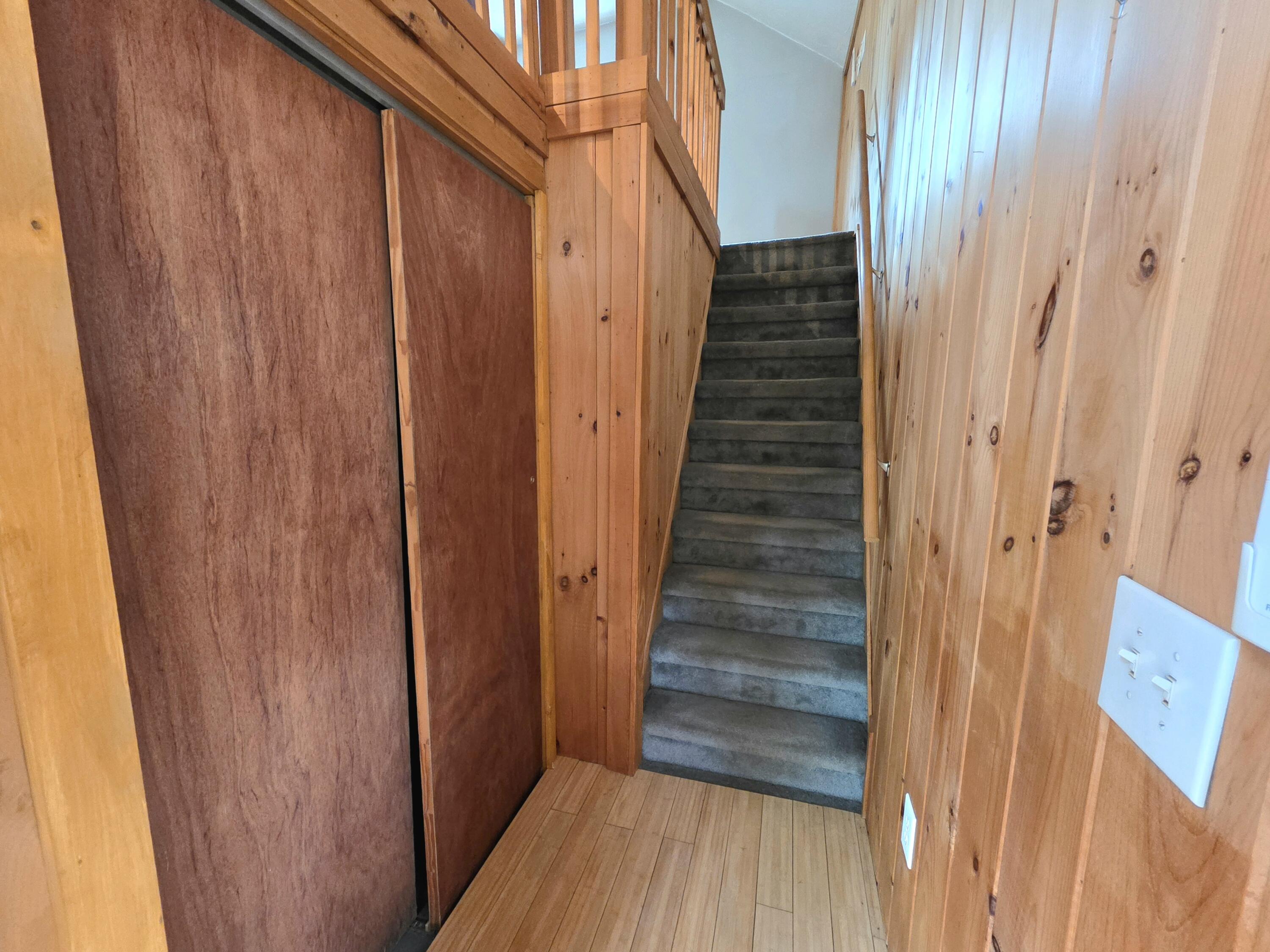 stairs to loft, closet has access hatch to basement