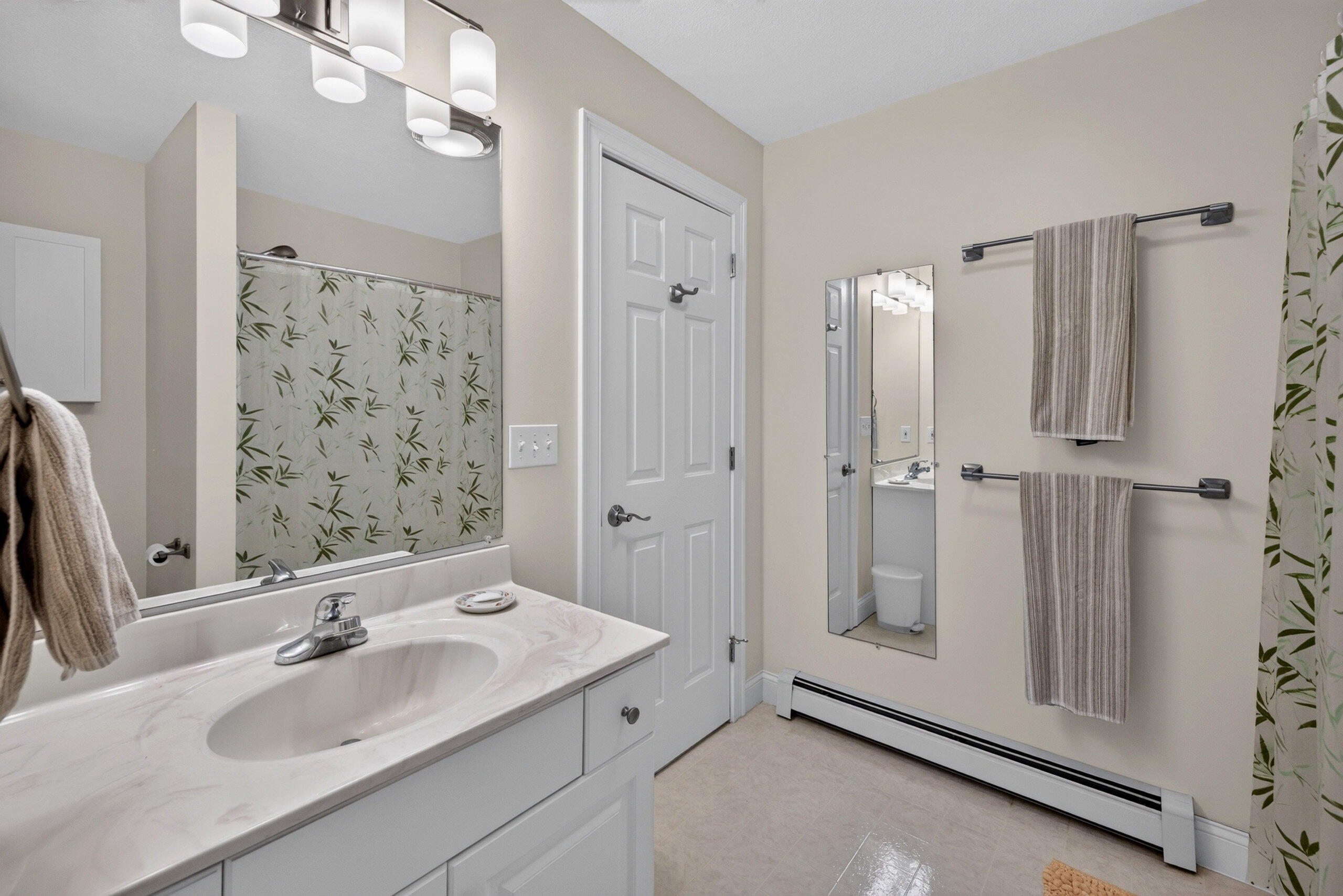 1 BD, 1 BA In-law above garage.