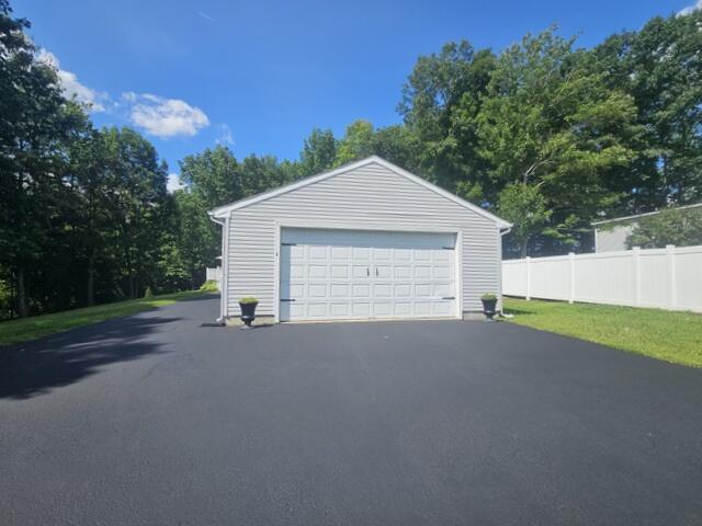 35. large 2 car garage with paved drive