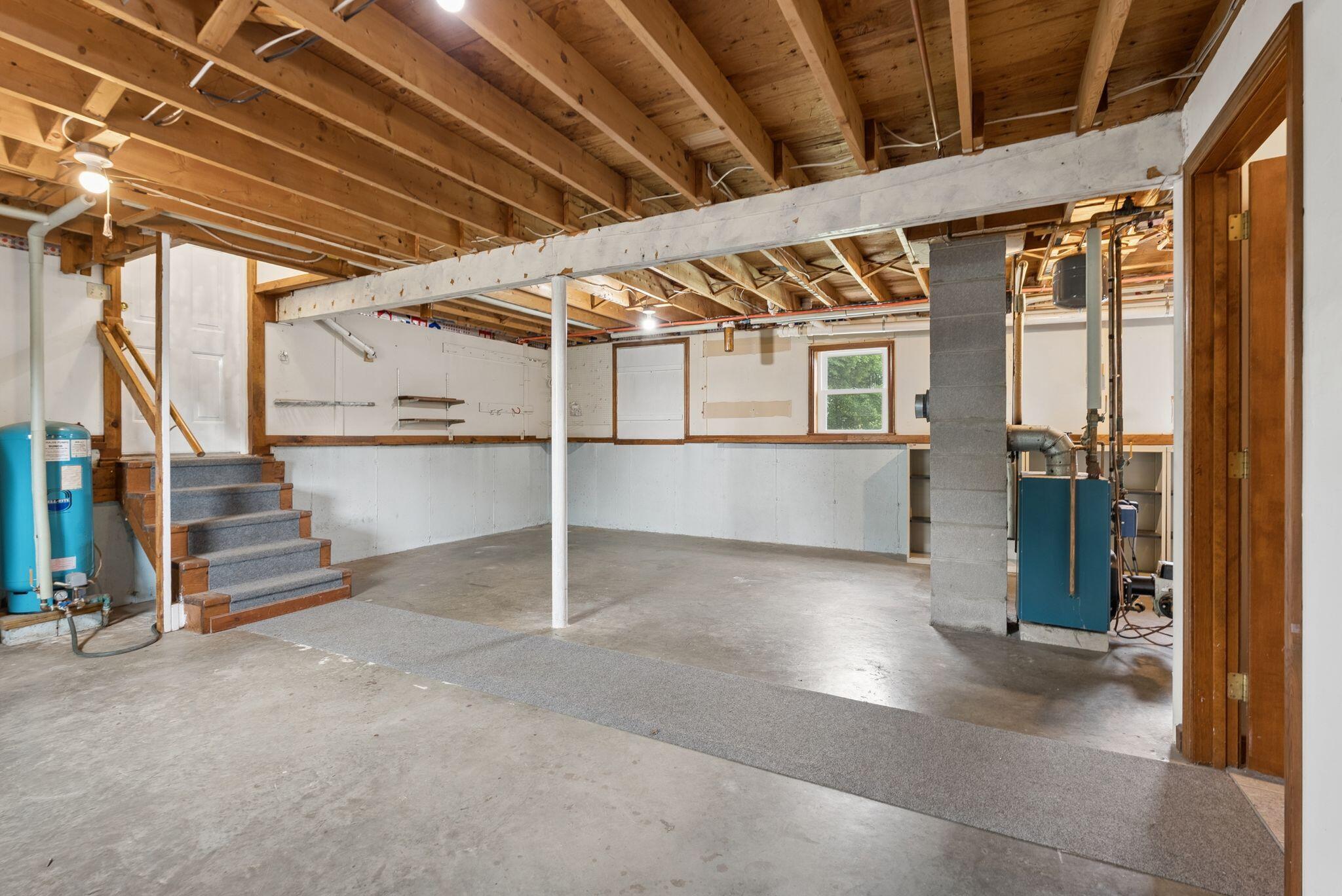 155 Ridge Road, Lisbon, ME 04252 The unfinished section of the lower level provides plenty of space to finish off as additional bedrooms, or flex space.