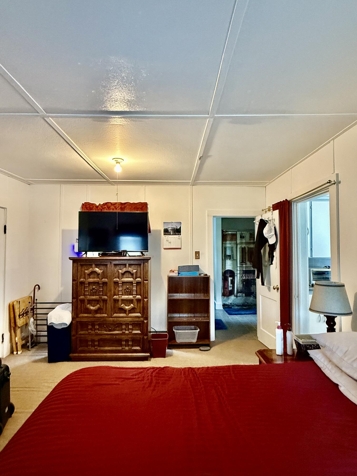 Downstairs room just off the kitchen- currently being used as bedroom