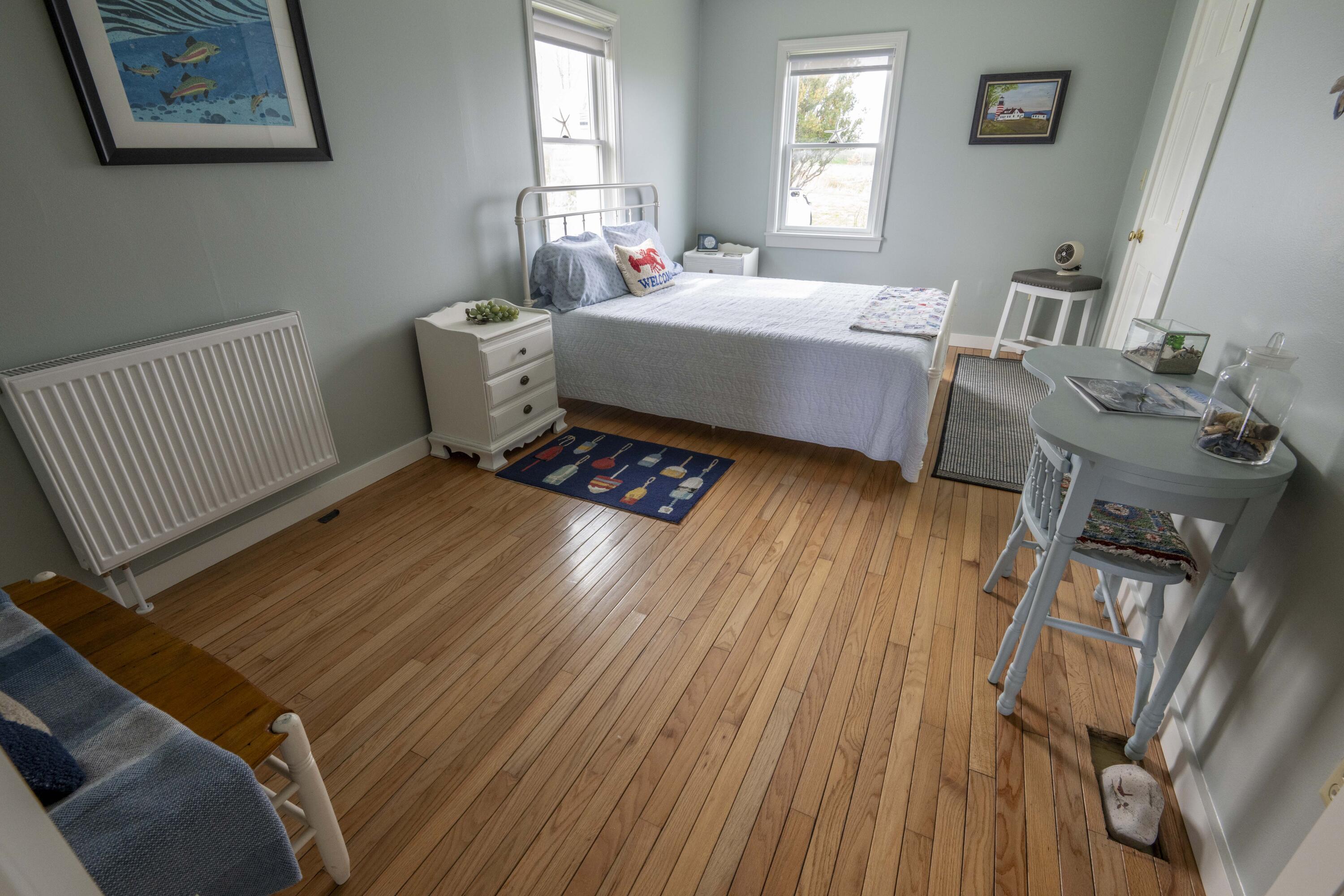 26 Madison Street, Eastport, ME 04631 Main floor bedroom with a bath next door