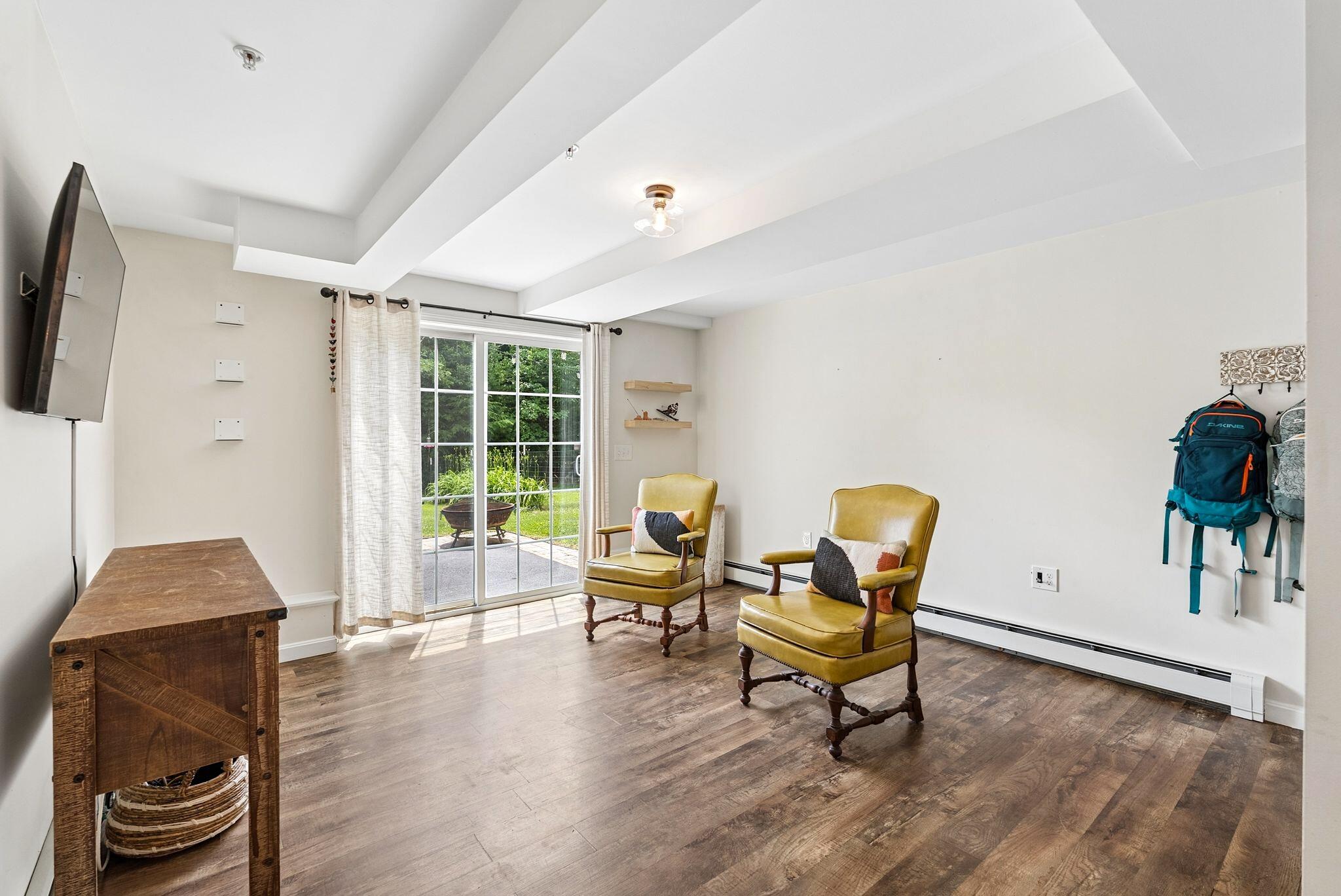 Living room with access to back patio