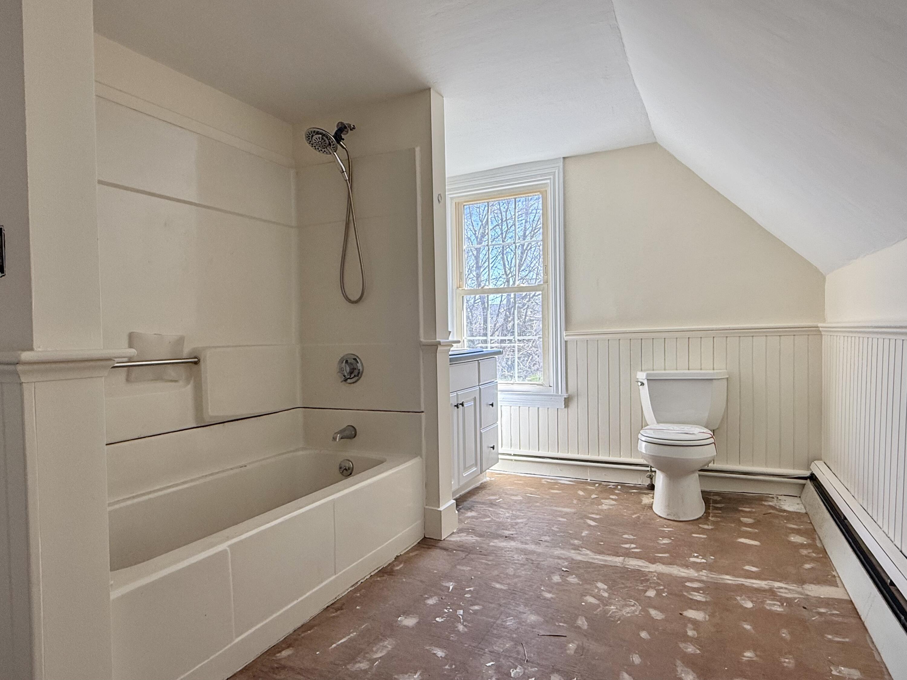 Freshy painted bath. Unfinished plywood floor awaits your choice of paint, tile, or wood!