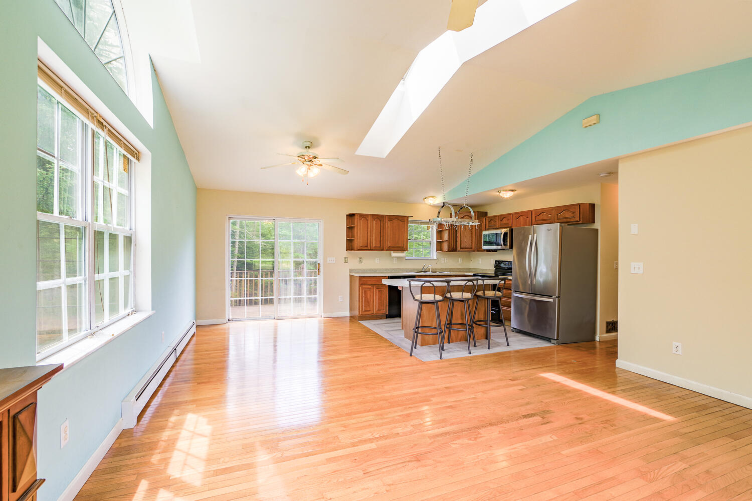 Open concept living space, with s slider to the back deck.