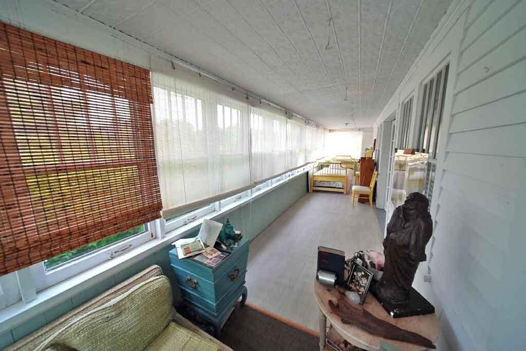 95 Sunset Park Road, Orient, ME 04471 sun-porch-wrap-around