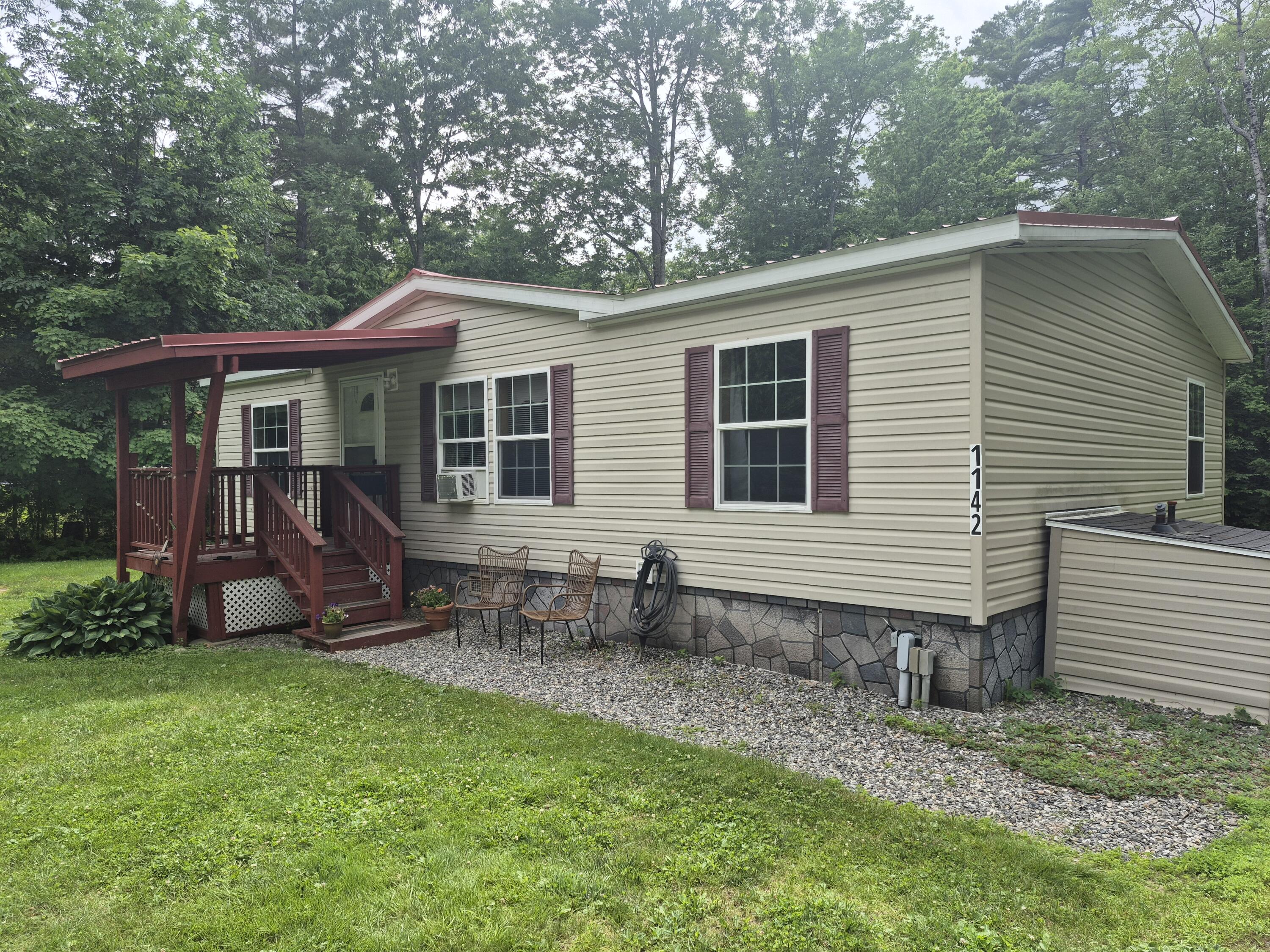 LONG POND ACCESS!!  Shared Access to Long Pond, one of the most sought after lakes in Maine.  Walk to Belgrade Lakes Village in this bright and sunny home!  Just across from Belgrade Lakes Golf Club, this well cared for property features 3 bedrooms with 2 full baths, an eat in kitchen, direct access living room, laundry room with an outdoor deck all on the same level!Easy one floor living plus a detached garage for your vehicle.  Discover the perfect blend of privacy and convenience in this wonderful setting, blending the outdoors with nature. This ranch-style home is set on a level lot that offers a peaceful country feel minutes from the public boat launches and clear waters of Great Pond and Long Pond. This prime Belgrade location provides easy access to the Belgrade Lakes Golf Club, Belgrade Lakes Village, local amenities, scenic hiking trails, the Kennebec Highlands, and world-class fishing--allowing you to enjoy seclusion without sacrificing convenience.  An oversized one-car garage with workshop space is ideal for vehicles, lake toys, and hobbies. Great possibilities for gardening, recreation, or simply enjoying the quiet Maine outdoors. Whether you're seeking a year-round home, a lakes-area retreat, or a private basecamp close to the Belgrade Lakes, this property offers exceptional potential in a highly desirable location. Schedule your showing today for a chance to make this property your own!