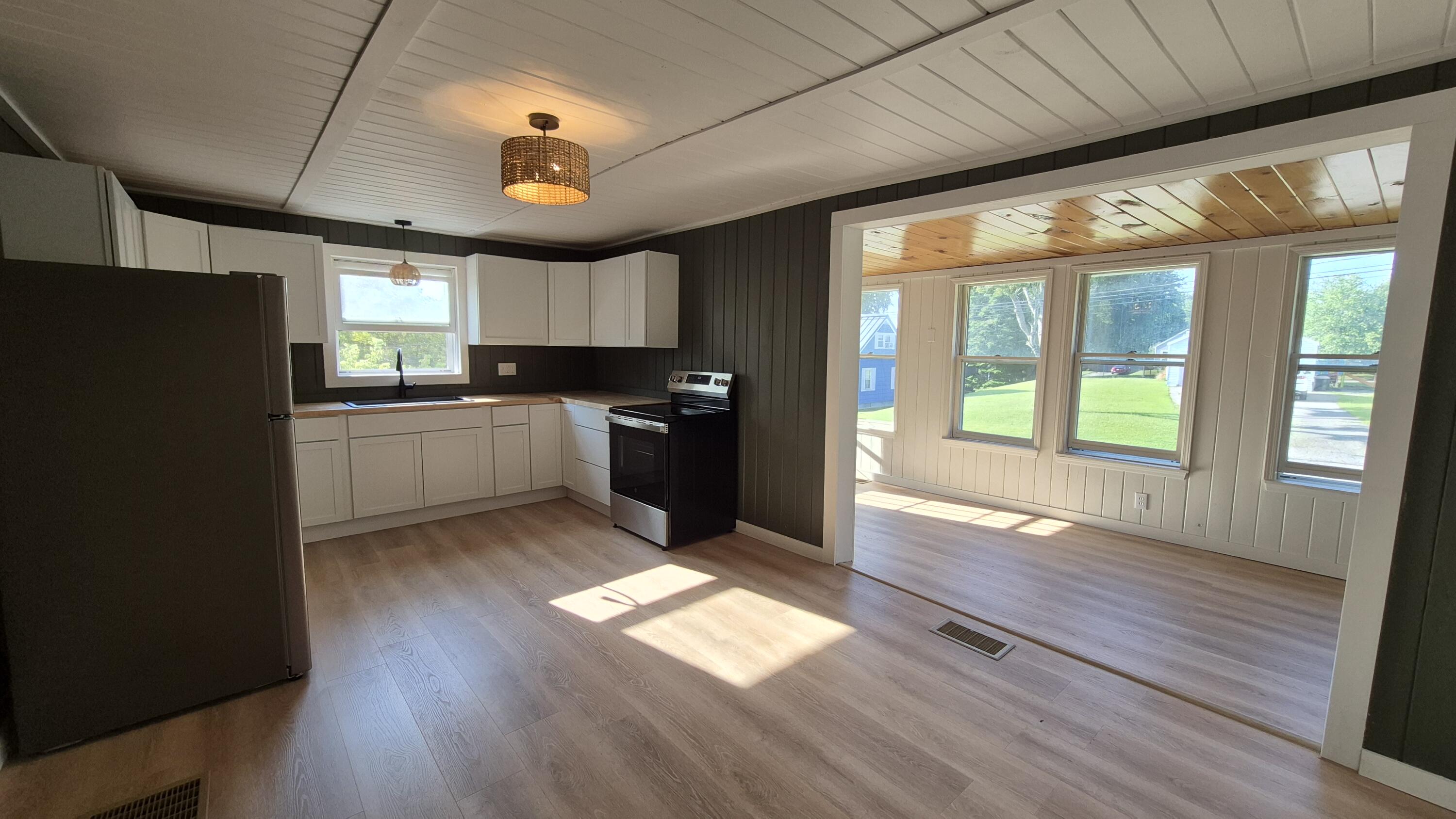 11 kitchen looking to the sunroom