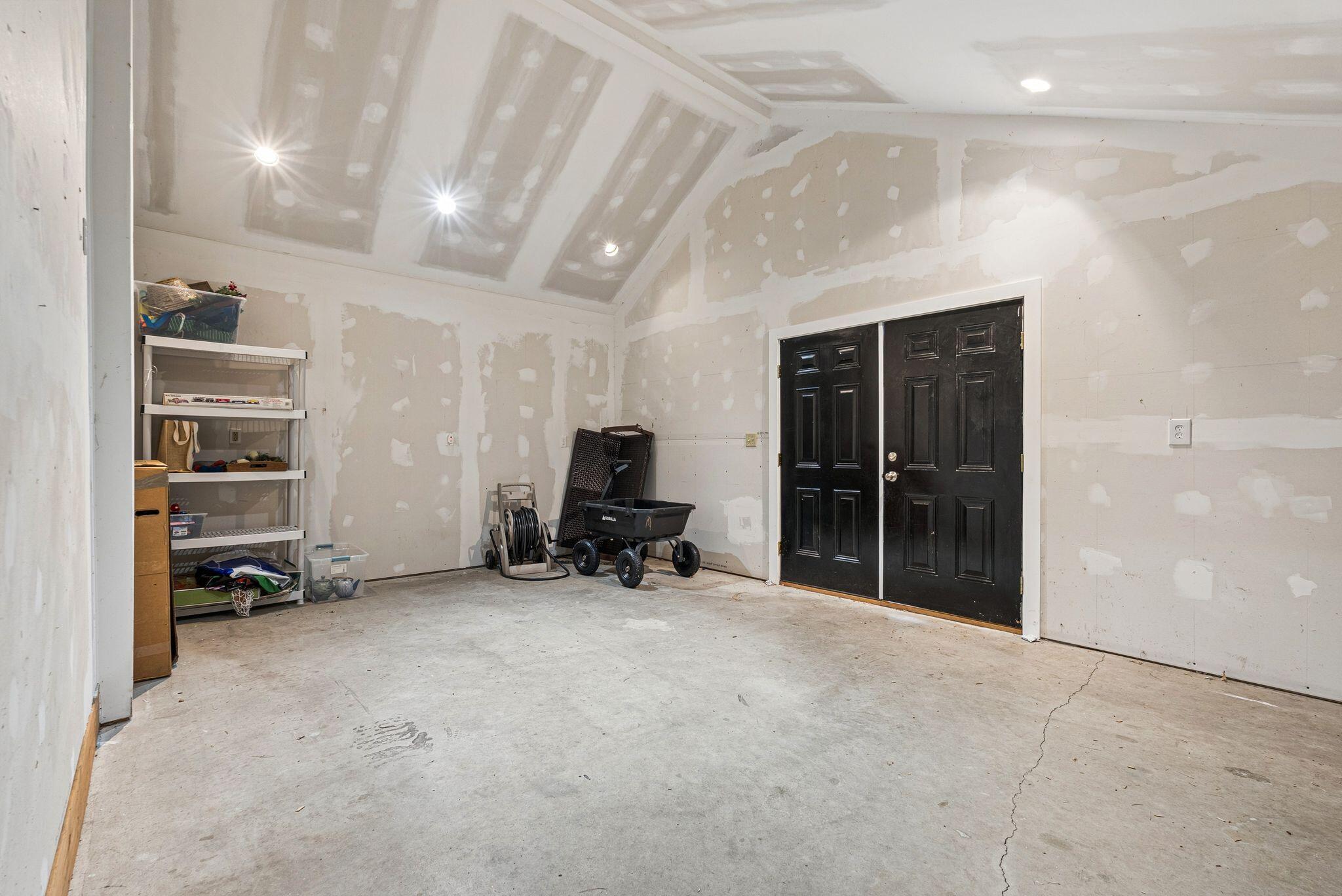 43 Pennsylvania Avenue, South Portland, ME 04106 This heated garage space area could also be used as a work out area.