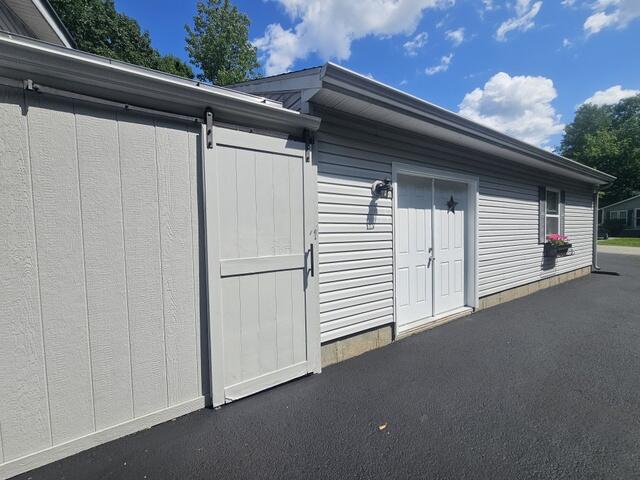 35.2 Lt side Side garage entrance & shed