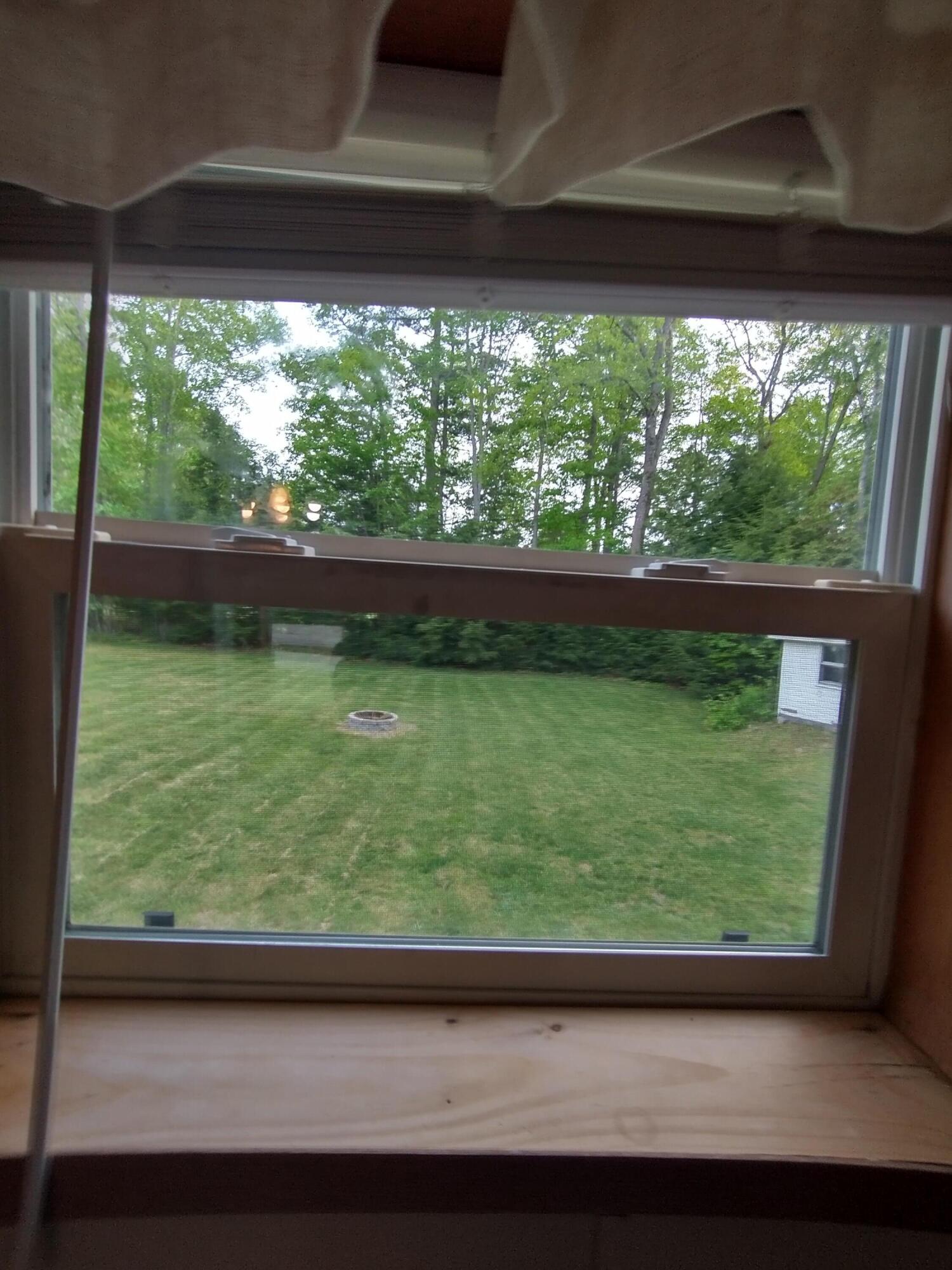 57 Carter Woods, Bradley, ME 04411 View of back yard from kitchen