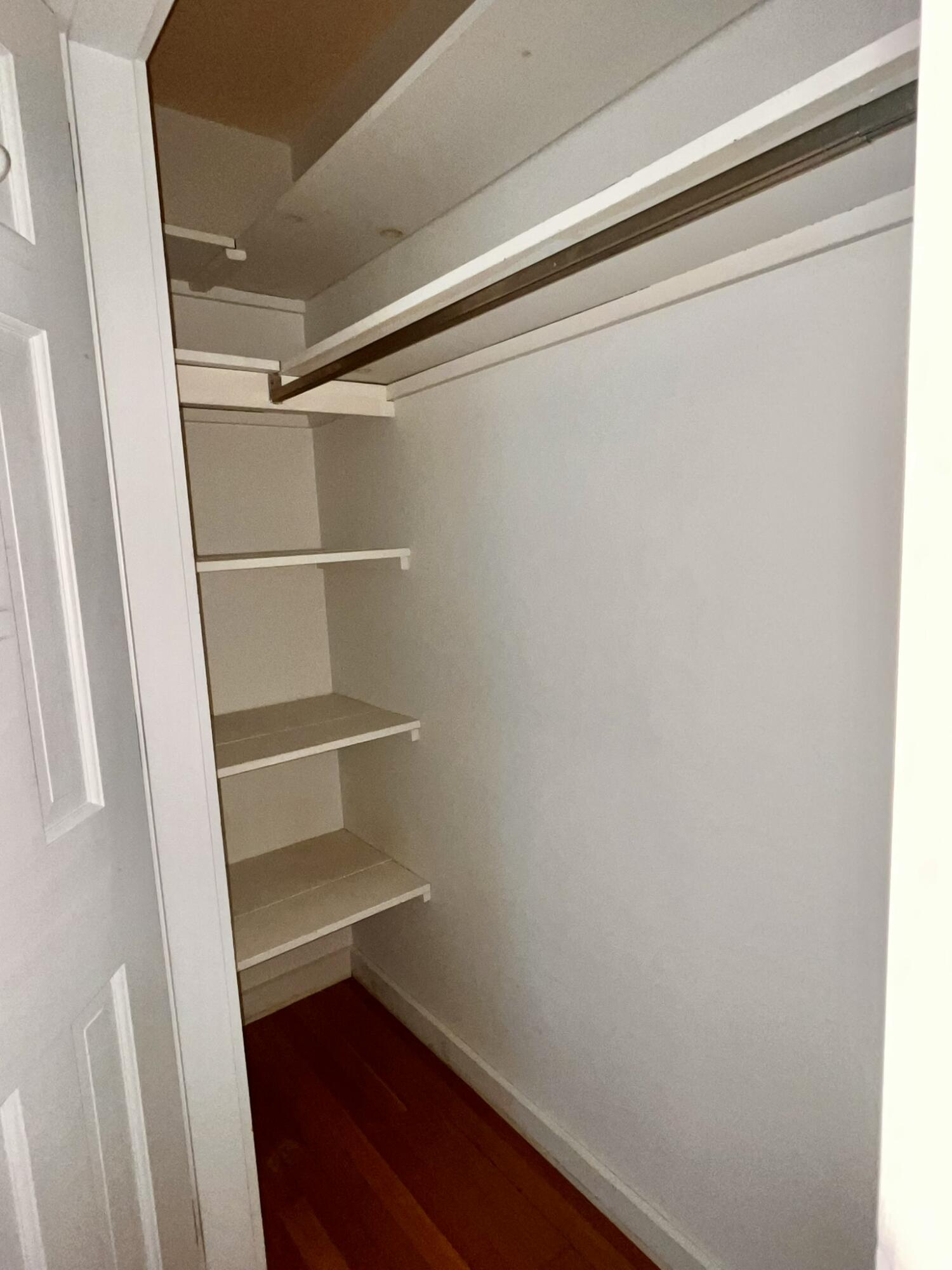 First floor primary bedroom has twin closets.