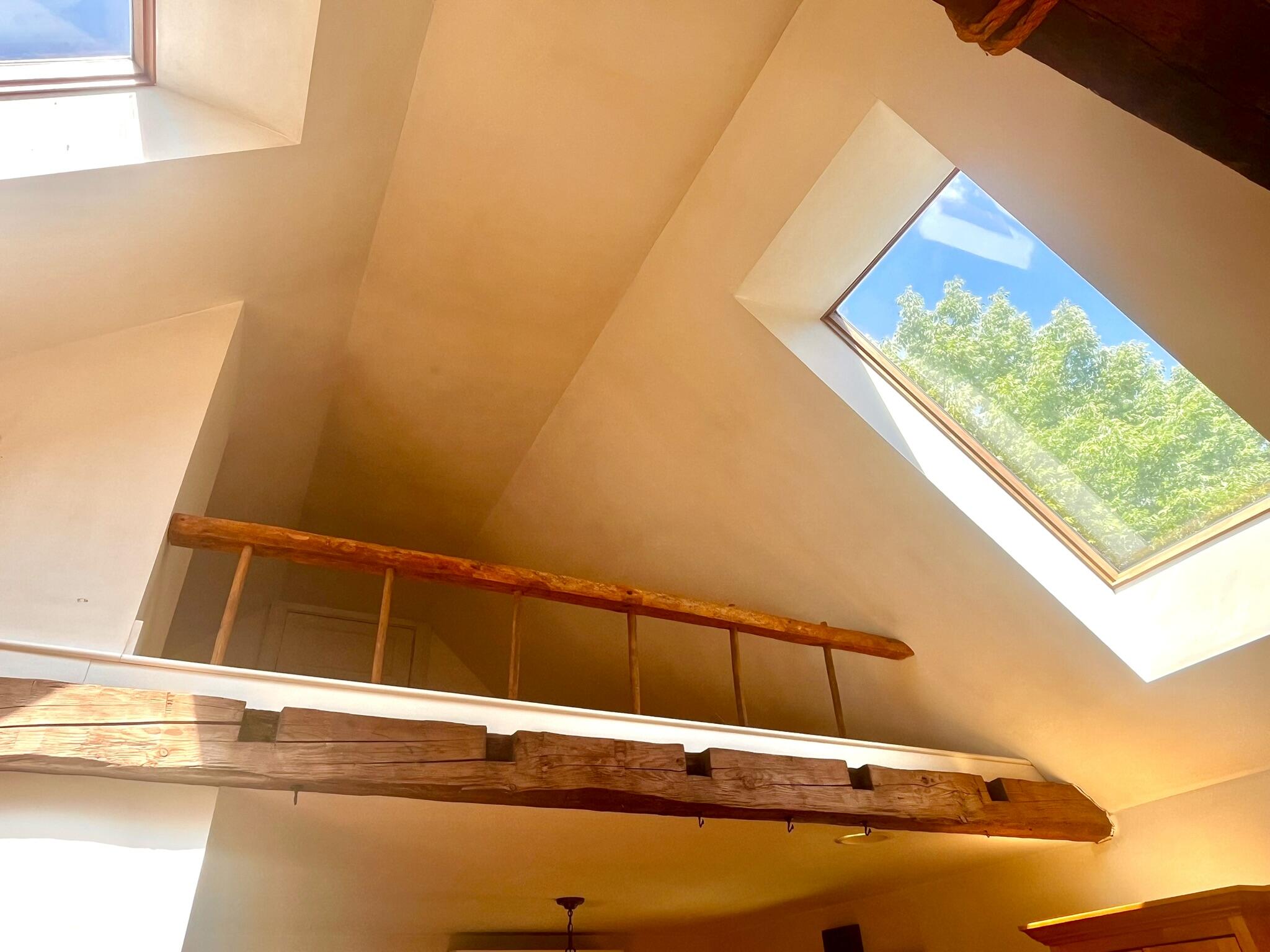 Skylights in kitchen with loft.