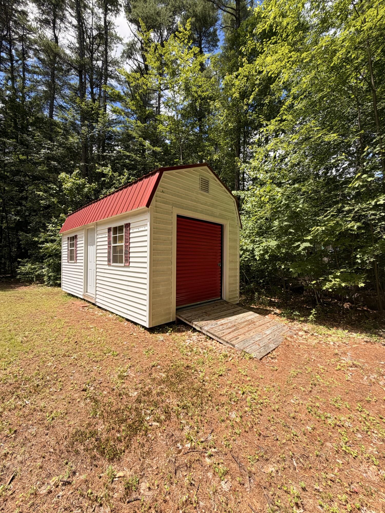 Shed with overhead doors