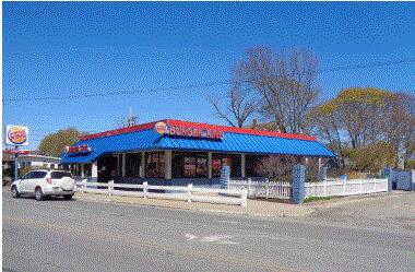 Highly visible corner commercial lot with single NNN tenant in place through November 2027. Generous rent for remainder of lease allows buyer time for planning and permitting new usage for this lot. OK to drive into parking lot, look in windows. No interior building access prior to signed contract.
