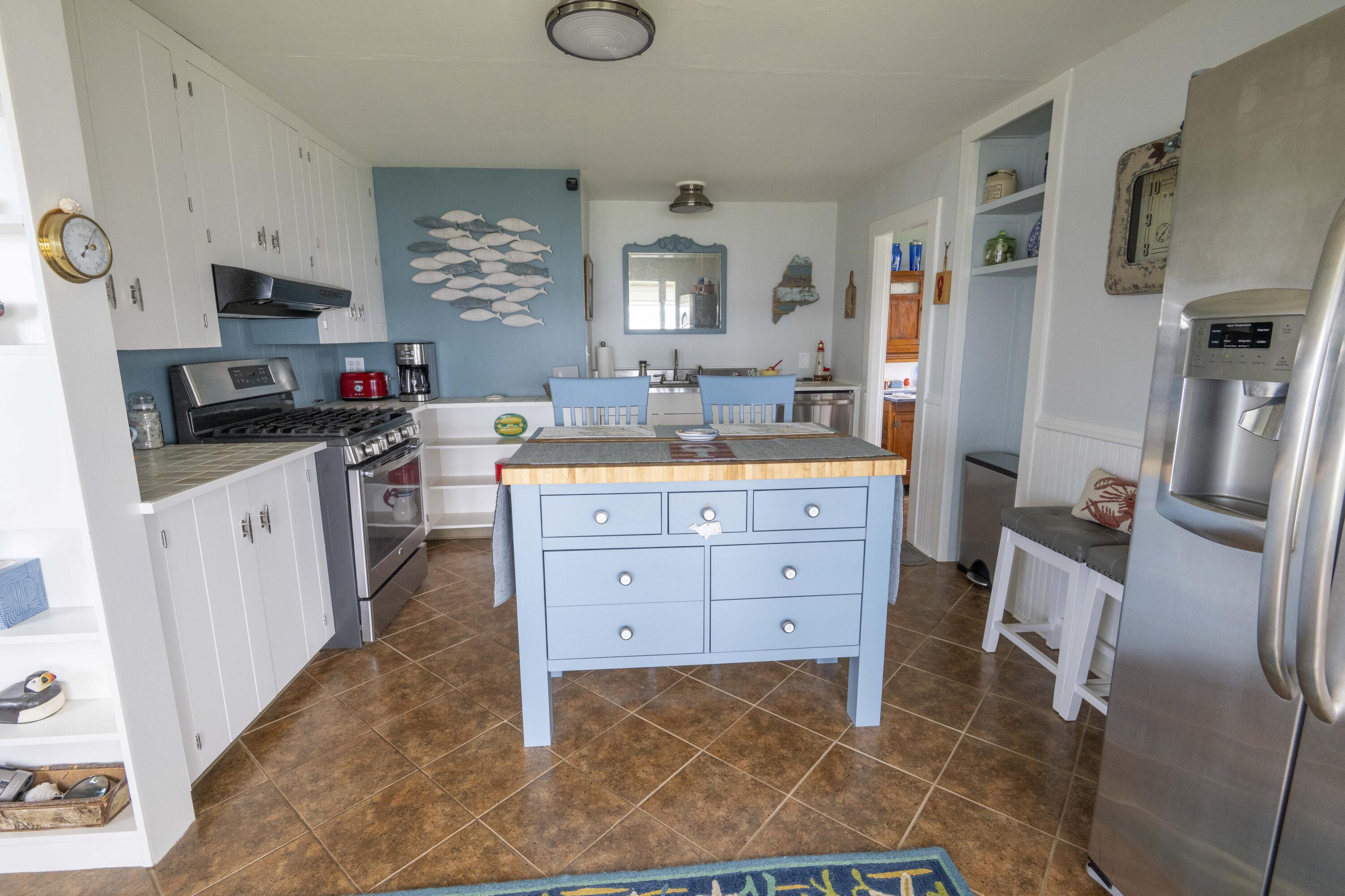 26 Madison Street, Eastport, ME 04631 Kitchen. It enjoys same view of sunrise looking thru the sunroom