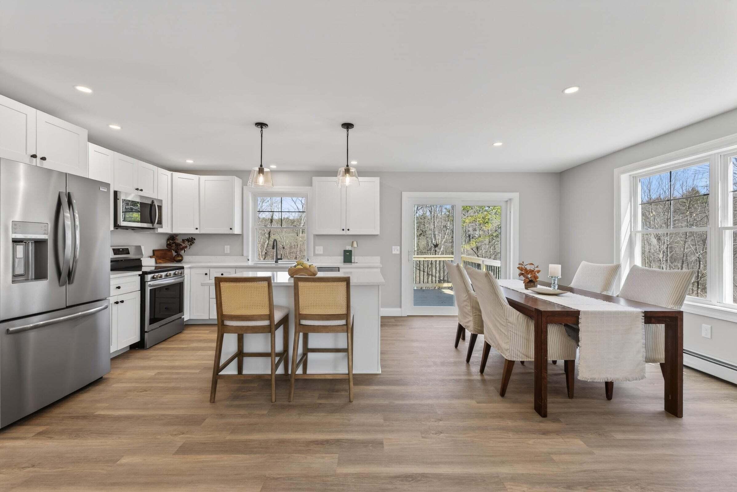 Adjacent kitchen and dining area