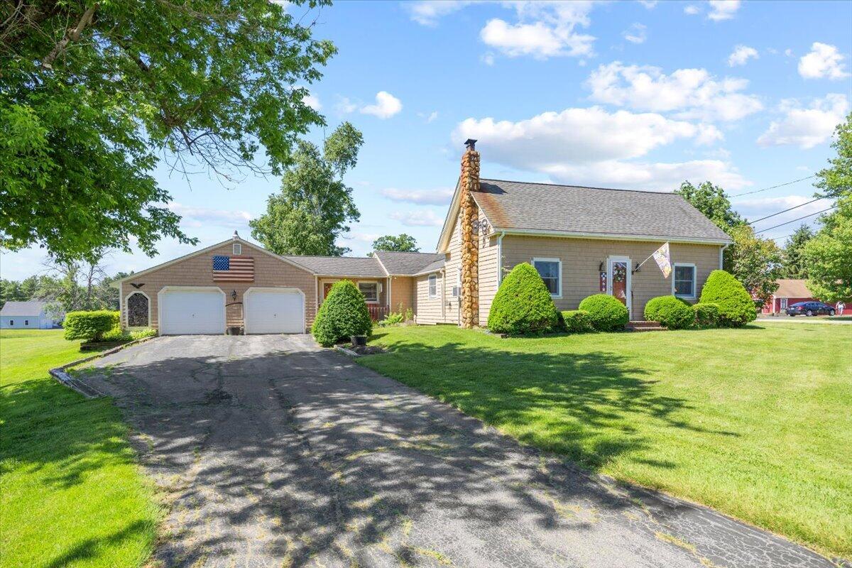 Country style Cape Cod home situated on a beautiful, wide open 2.2 acres of green grass. This home has always been very well maintained. The 1st floor offers a nice updated kitchen, a large family room, front living room, breezeway room between the house and garage, a full bathroom and a master bedroom. The 2nd floor offers two more bedrooms. The over sized 3 car garage is great for extra room for work benches, tools, lawnmower, snowblower etc, while still having the cars parked inside. Located in a country setting in vicinity of horse farms, yet only minutes to I95, all major shopping & local beaches. 20 minutes to Portland. This home location is eligible for Rural Development financing. Must see home!