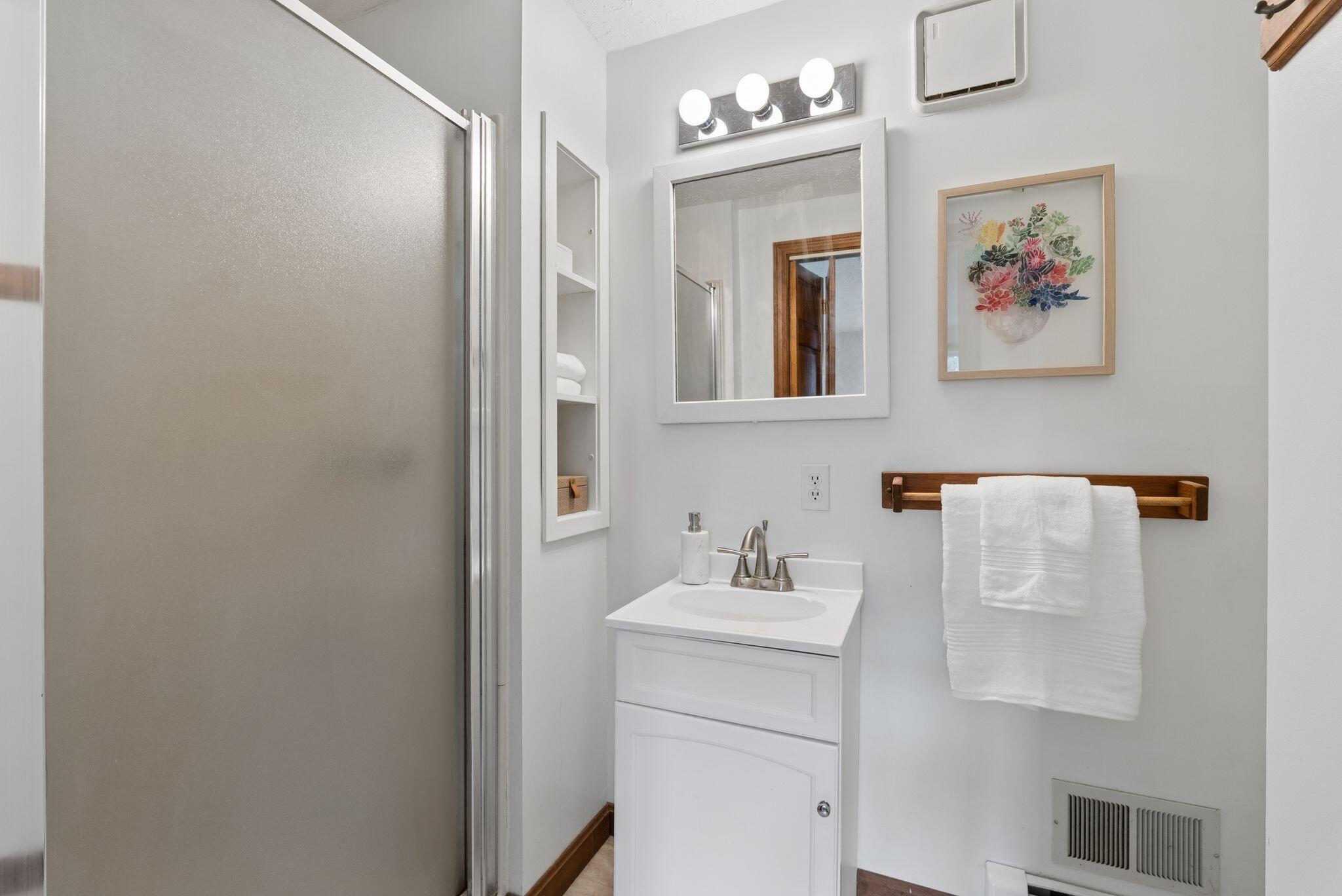 155 Ridge Road, Lisbon, ME 04252 The lower level bedroom features an en-suite bathroom.