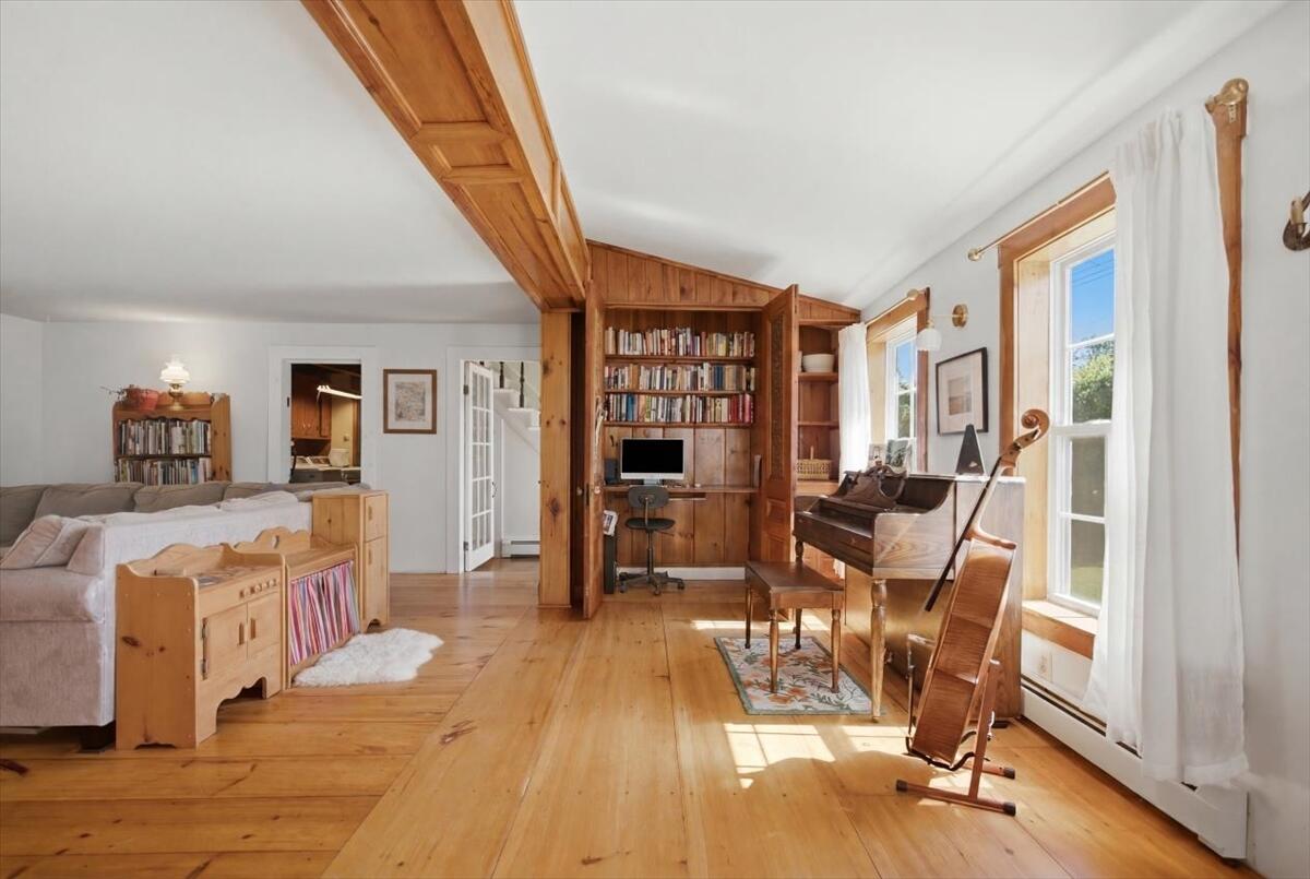 Office area tucked into a closet for privacy